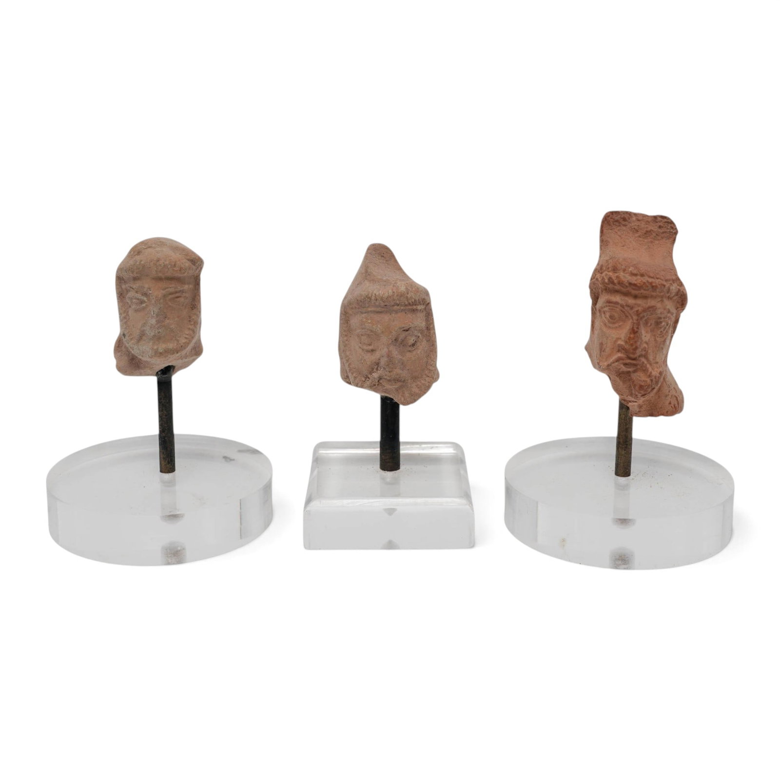 (3 pc) Ancient Achaemenid Persian Period Terracotta Heads: (3 pc) Ancient Achaemenid Persian Period Terracotta Heads Approx. c. 4th Century B.C.-2nd Century A.D., Ancient Iran This lot features three ancient mold-made terracotta miniature male heads elegantly