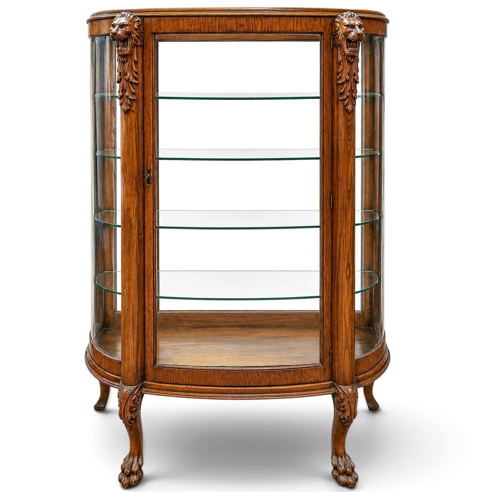 Antique French Empire Revival Vitrine Cabinet: Antique French Empire Revival Vitrine Cabinet Late 19th-early 20th century Antique turn-of-the-century quarter-sawn oak curved-glass china cabinet featuring prominent hand-carved lion head corbels and