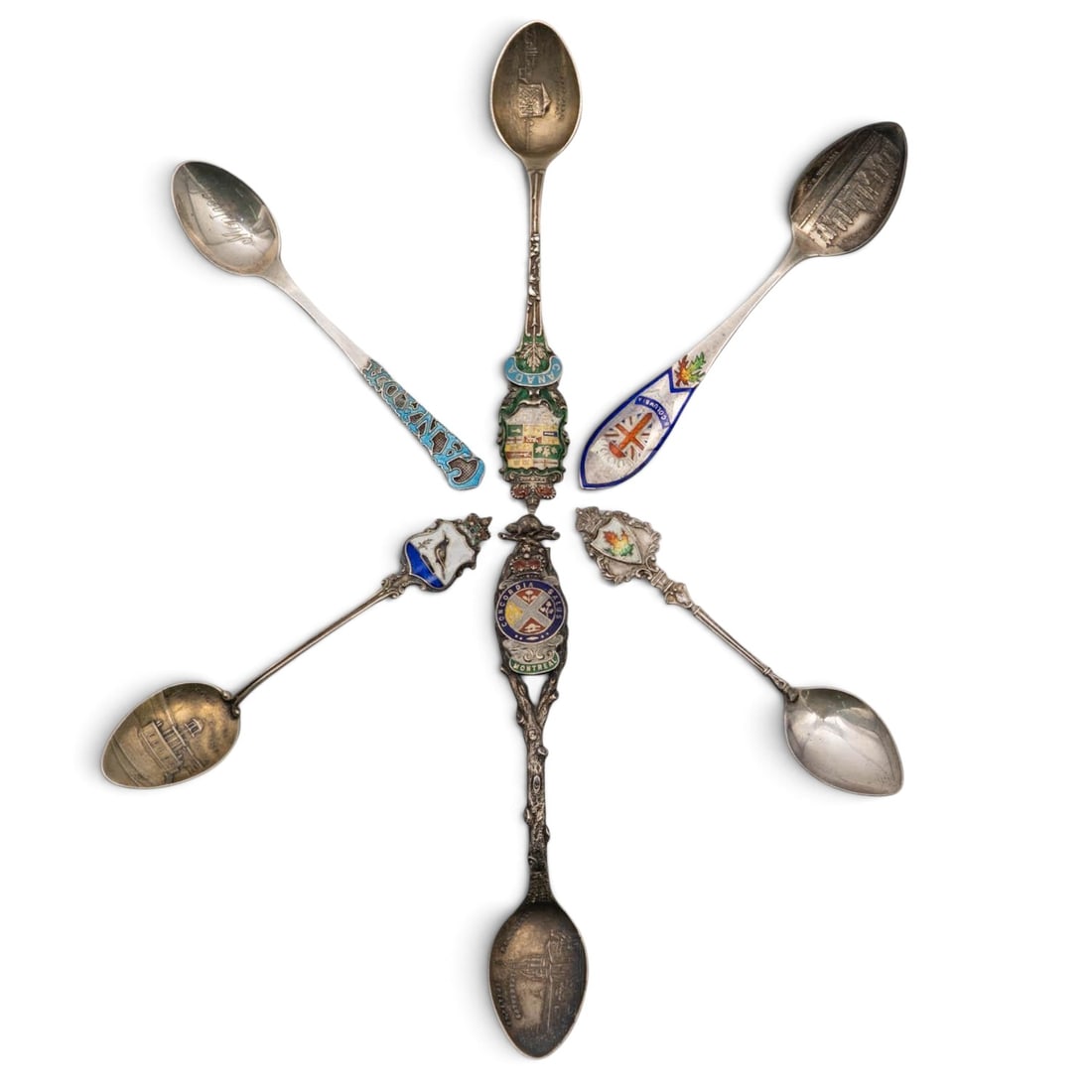 (6 pcs) Canadian Souvenir Sterling Enamel Spoons: (6 pcs) Canadian Souvenir Sterling Enamel Spoons Late 19th-20th century Canadian Sterling & enamel souvenir spoons. (1) Henry Birks & Sons sterling souvenir spoon, St Peters Cathedral Montreal Marked 