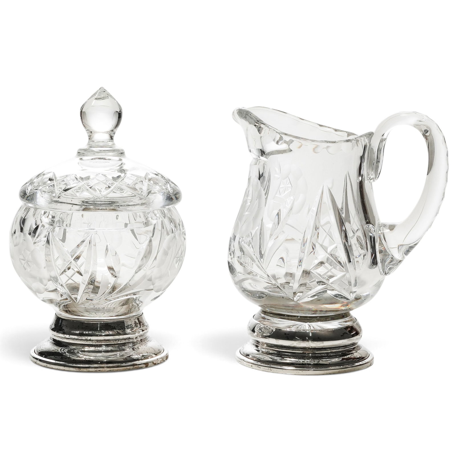 (2 pc) J.C. Boardman & Co. Sterling & Cut Crystal Covered Sugar Bowl & Creamer: (2 pc) J.C. Boardman & Co. Sterling & Cut Crystal Covered Sugar Bowl & Creamer 20th century, USA Matching 2-piece vintage Cut crystal set consists of a covered sugar bowl and a cream pitcher. The Desi