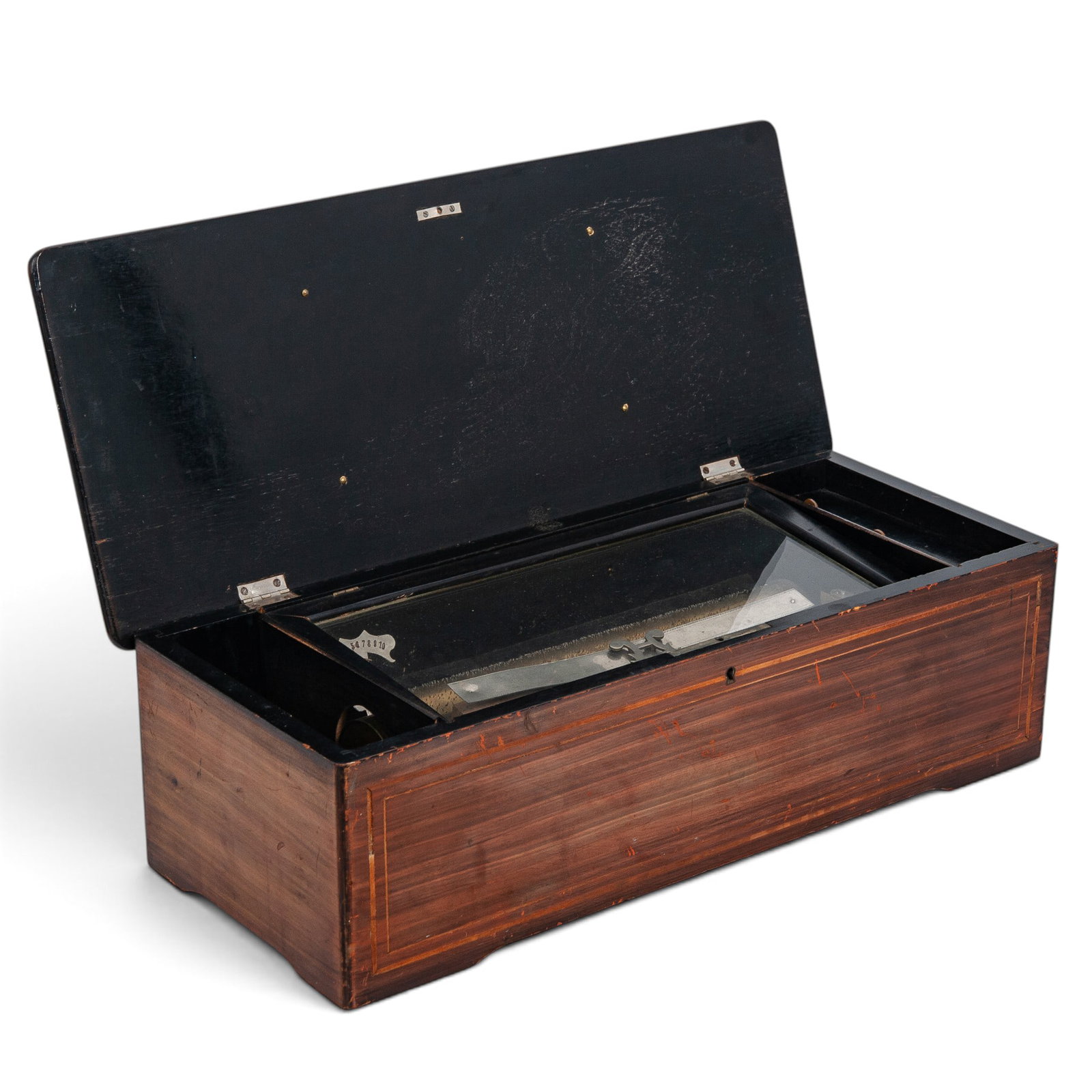 19th Cent. Swiss Cylinder Music Box: 19th Cent. Swiss Cylinder Music Box 19th Cent., Swiss This Antique music box utilizes a classic revolving brass cylinder pinned with thousands of individual teeth that pluck a tuned steel musical comb