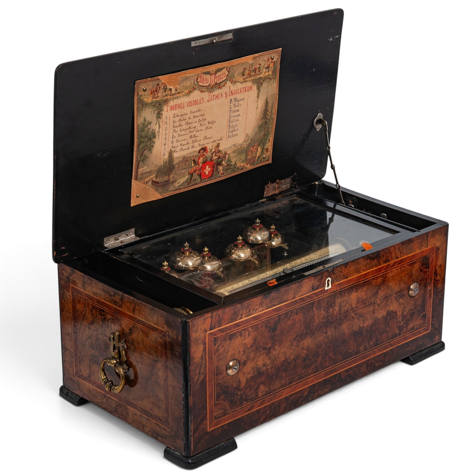 19th Cent. Swiss Cylinder Music Box: 19th Cent. Swiss Cylinder Music Box 19th Cent. Swiss This Swiss cylinder music box is housed in a finely crafted burl wood and ebonized case, with its exterior lid inlaid with iridescent mother-of-pea