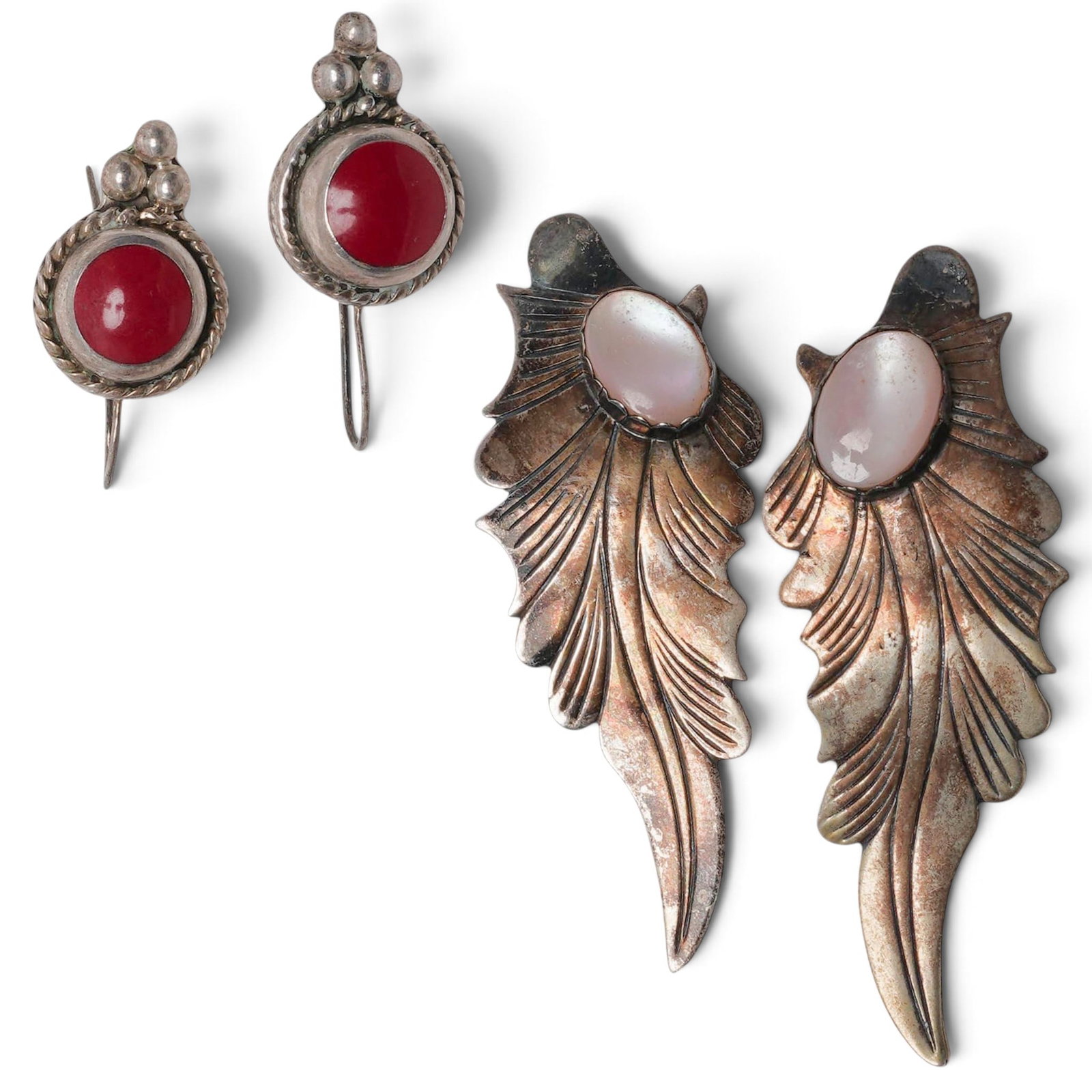 (2 Pcs) Sterling Silver MOP and Carnelian Earring Group, Signed: (2 Pcs) Sterling Silver MOP and Carnelian Earring Group, Signed Late 20th Century, USA/ Mexican Group of two pairs of sterling silver earrings including a large L.M. Nez Navajo feather-form pair with 