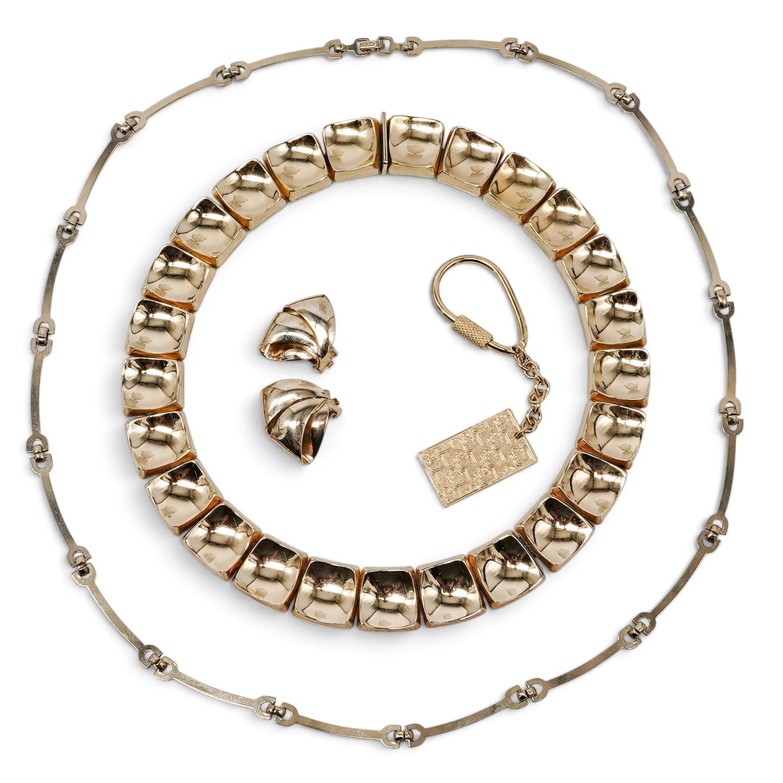 (4pc) Christian Dior Accessories: (4pc) Christian Dior Accessories 20th Cent. German The lot comprises: (1)Christian Dior gold-tone necklace featuring curved geometric links with a polished finish. Signed on the clasps, "Christian Dio