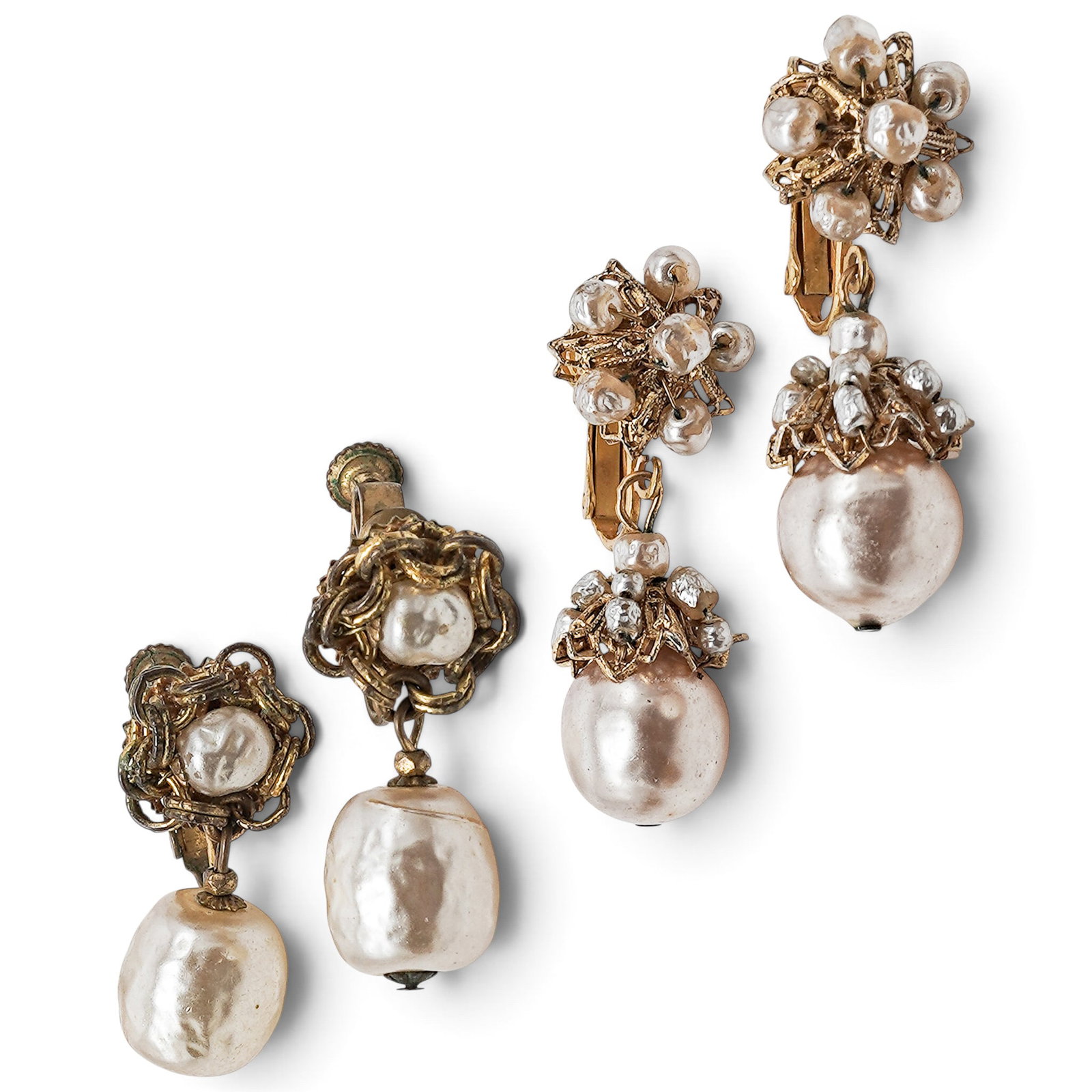 (2pc) Miriam Haskell Faux Baroque Pearl Drop Dangle Earrings: (2pc) Miriam Haskell Faux Baroque Pearl Drop Dangle Earrings Circa 1940-1950. American Miriam Haskell clip-on earrings, 2-pair lot showcasing the designer's signature hand-wired craftsmanship. The gro