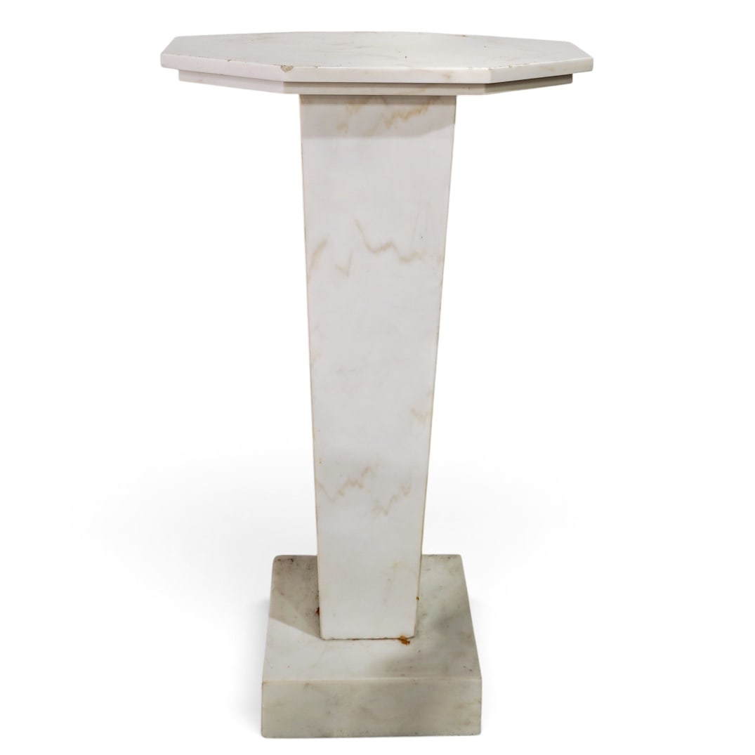 Contemporary White Marble Pedestal: Contemporary White Marble Pedestal 20th century Contemporary white marble pedestal with the bold, architectural geometry of the octagonal top and the heavily tapered, angular base echoing the streamli