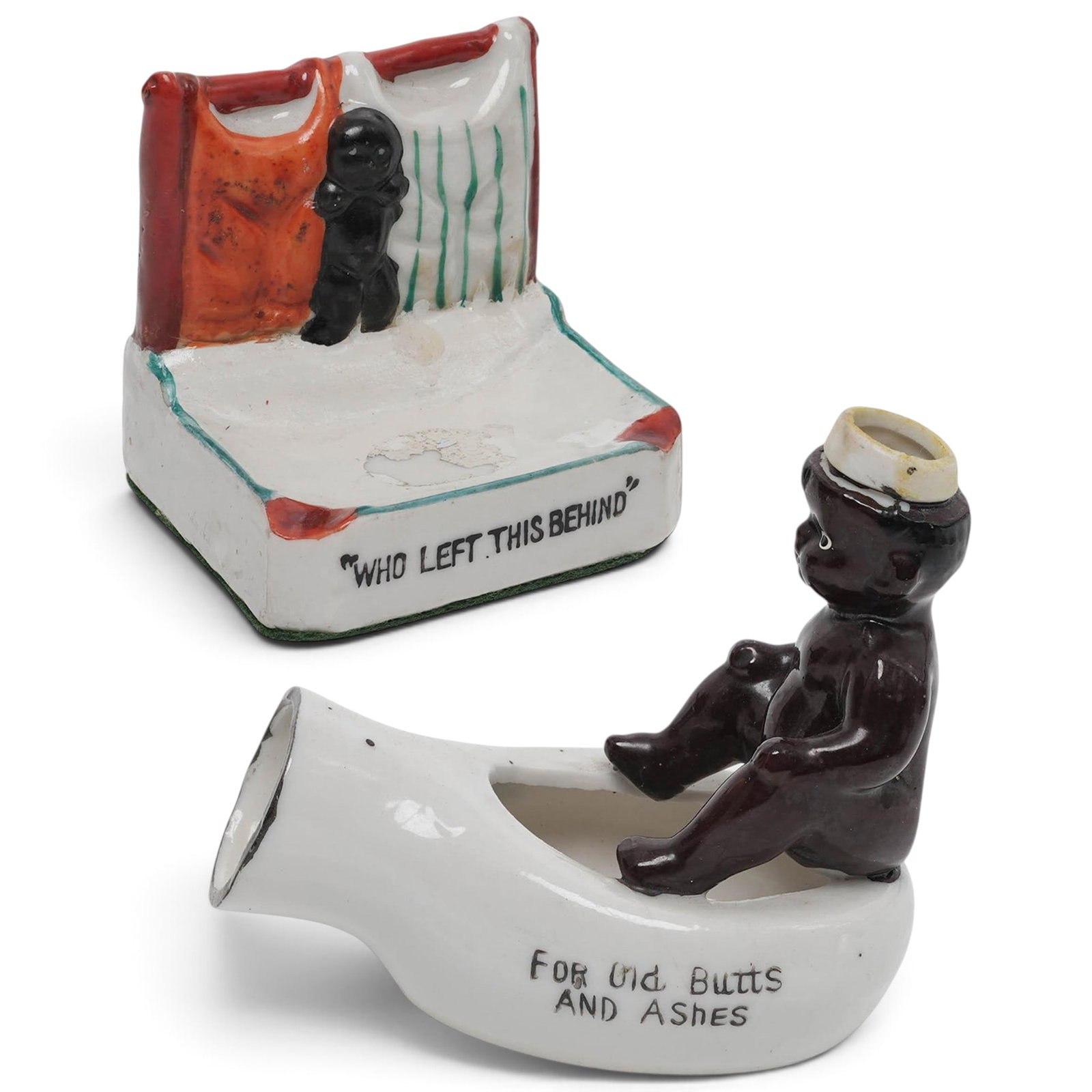 (2 pcs) Black Americana Porcelain Ashtrays: (2 pcs) Black Americana Porcelain Ashtrays Early 20th century A set of two Black Americana porcelain ashtrays. (1) Reads across front of base "Who Left This Behind", features a figure climbing between