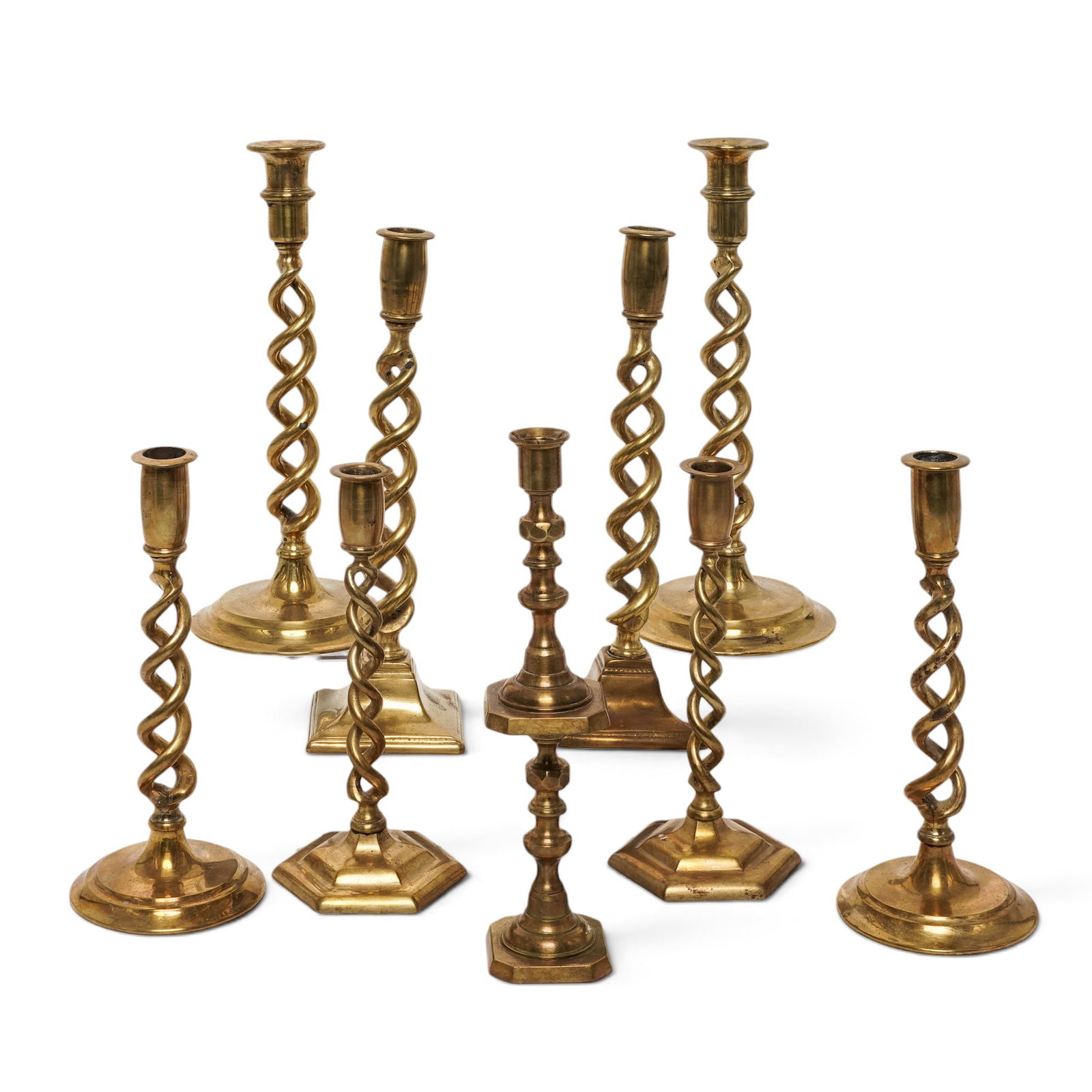(10 pc) Victorian Cast-Brass Barley Sticks: (10 pc) Victorian Cast-Brass Barley Sticks c.1880s-1920s, European (10 pc) Victorian Cast-Brass barley candle holders Five matching pairs: heavy, cast-brass pieces date from the late 19th century to