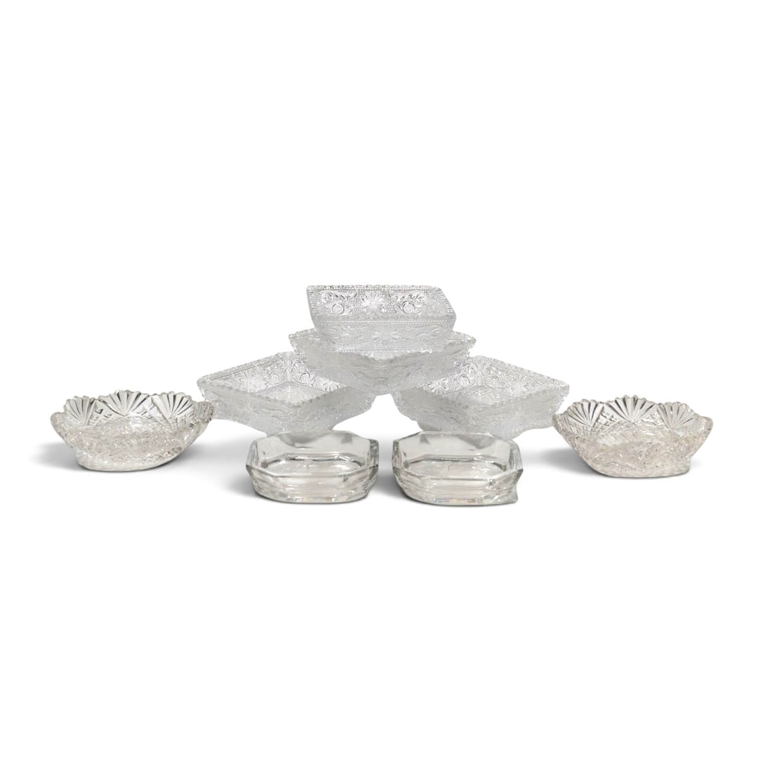 (8 Pc) Assorted Vintage Cut Crystal Butter Pats & Salt Cellars: (8 Pc) Assorted Vintage Cut Crystal Butter Pats & Salt Cellars Early 20th Century, USA An assortment of eight vintage pressed and etched crystal table articles. Includes square butter pat dishes with 
