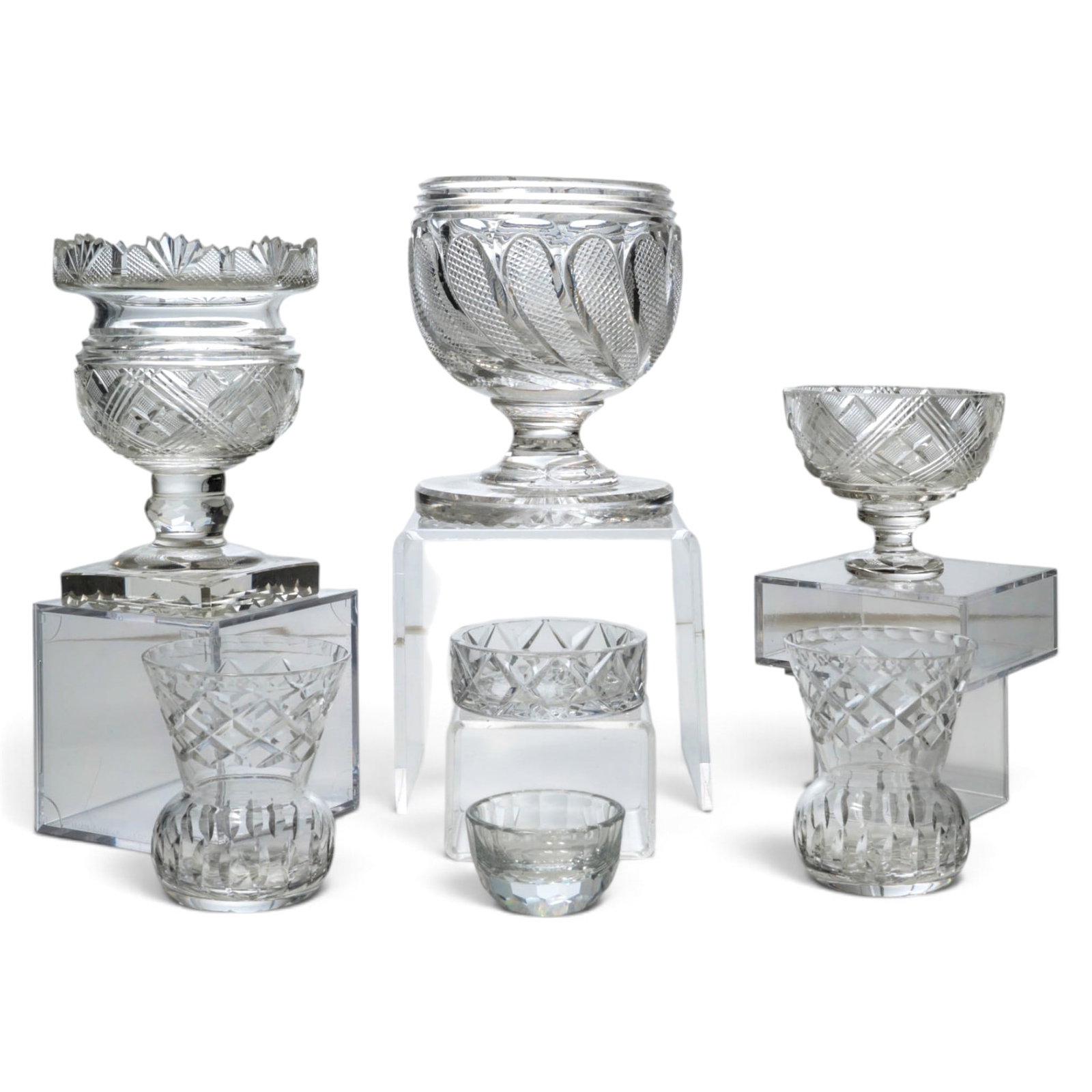 (7 pc) Assortment of Crystal Cut Tableware: (7 pc) Assortment of Crystal Cut Tableware 20th Cent Assortment of crystal functional and decorative table items. (1) American Brilliant Cut small crystal vase with square base (1) Swarovski crystal s