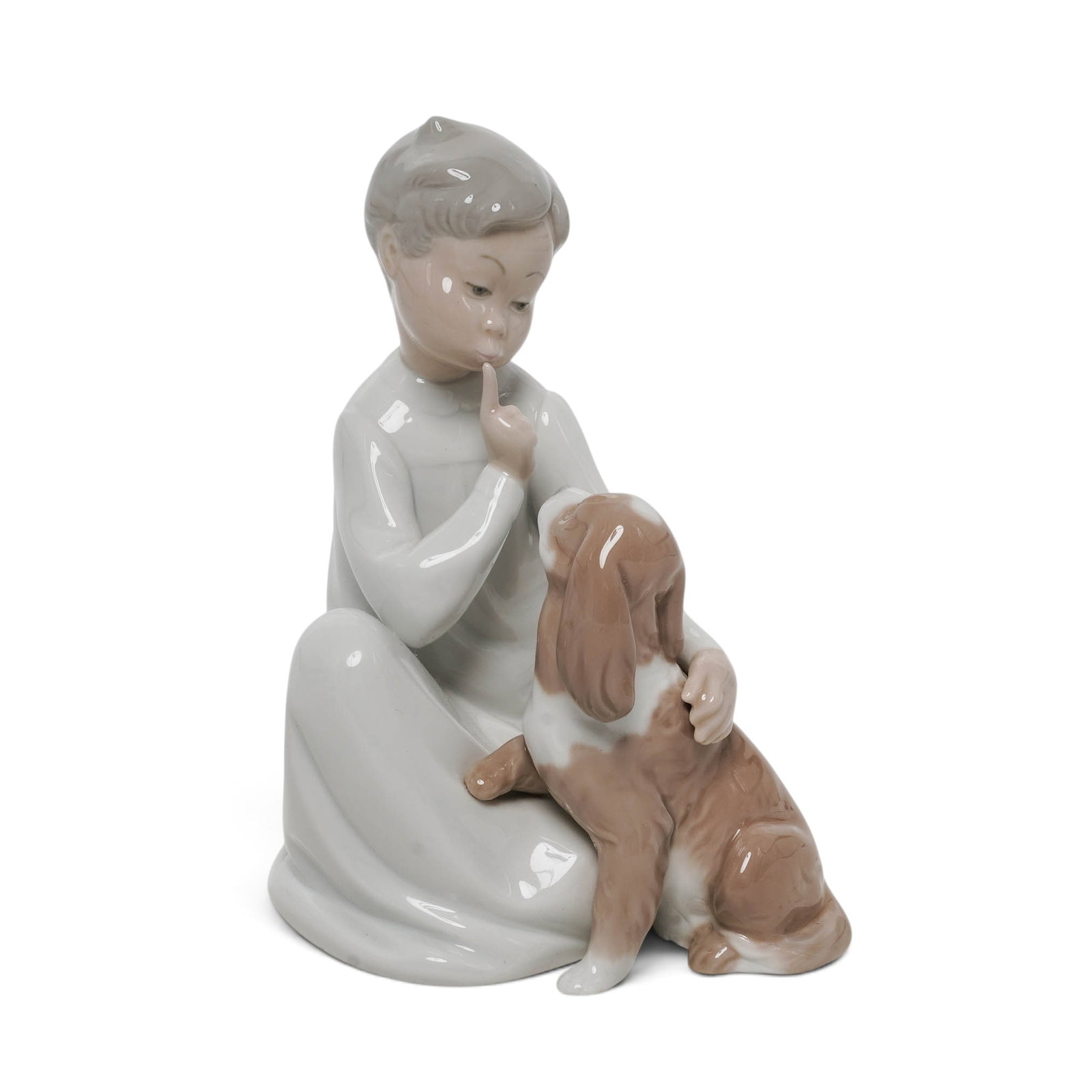 Lladro "Boy with Dog" Porcelain Figurine: Lladro "Boy with Dog" Porcelain Figurine c. 1970, Spanish Lladró "Boy with Dog" (#4522) glazed porcelain figurine.Figurine DetailsTitle / Subject: Often referred to as "Boy with Dog," "Shhh, Quiet Pu