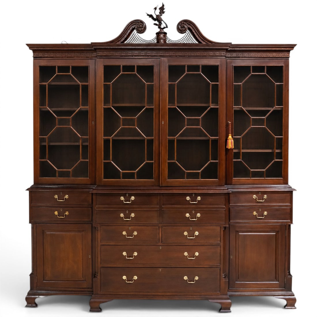 Attributed Stickley Chippendale Breakfront Bookcase Cabinet: Attributed Stickley Chippendale Breakfront Bookcase Cabinet Mid 20th Century, USA A Chippendale mahogany breakfront bookcase cabinet attributed to Stickley, featuring a molded swan-neck pediment with