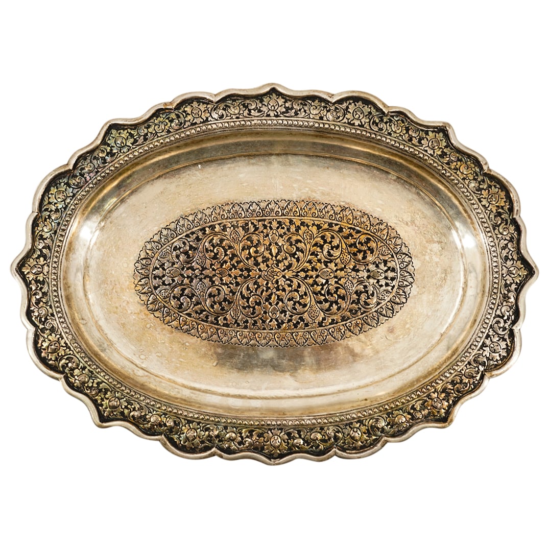 Antique Indian Silver Floral Tray: Antique Indian Silver Floral Tray 19th Cent. India Antique four footed, silver tray featuring ornately etched floral designs in its well and on its lip. Total weight: 680 g. H: 1.5" W: 9.75" L: 13.5"
