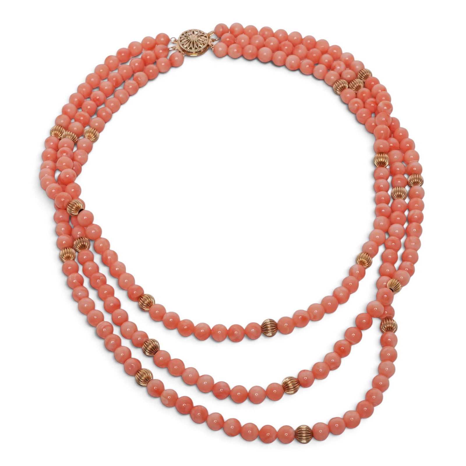 Vintage 14K Gold & Angel Skin Coral Multi-Strand Bead Necklace: Vintage 14K Gold & Angel Skin Coral Multi-Strand Bead Necklace 20th Century A three-strand necklace composed of graduated angel skin coral beads accented with ribbed 14K yellow gold spacer beads and c