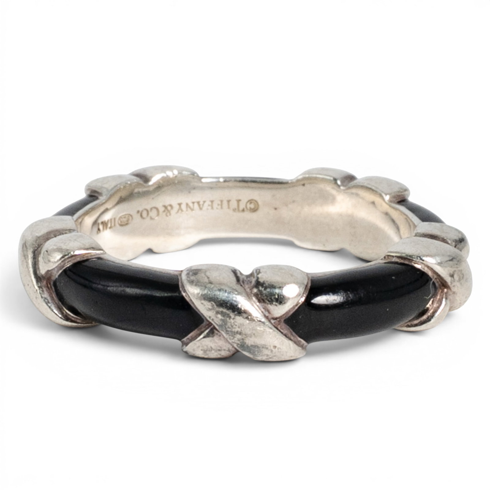 Tiffany & Co. Signature X Sterling Silver Black Enamel Ring: Tiffany & Co. Signature X Sterling Silver Black Enamel Ring 2000s, USA/ Italian Sterling silver band from Tiffany & Co.'s Signature X collection featuring alternating polished "X" motifs and glossy bl
