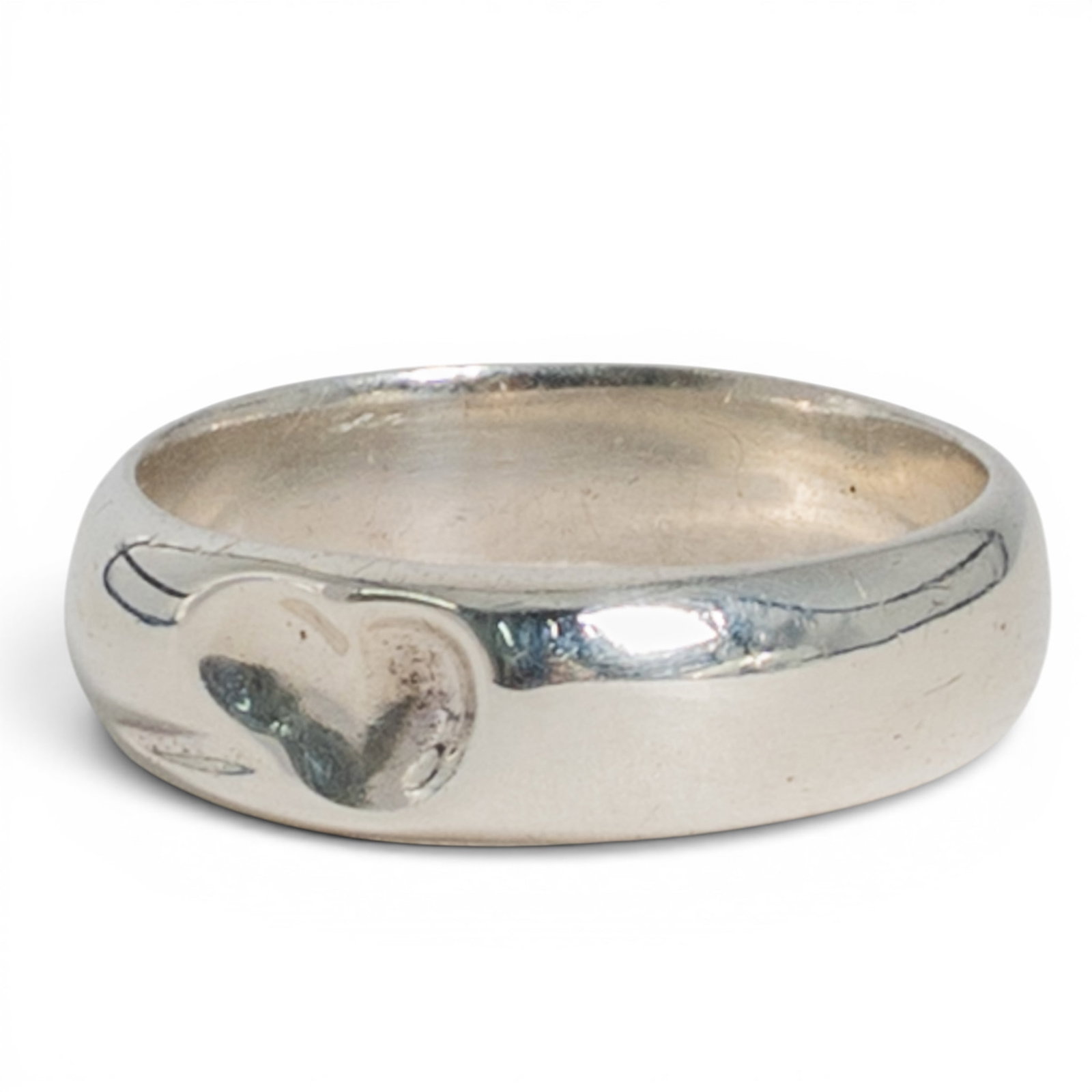 Elsa Peretti for Tiffany & Co. Sterling Silver Teardrop Heart Band Ring: Elsa Peretti for Tiffany & Co. Sterling Silver Teardrop Heart Band Ring 1990s, USA/ Spanish Sculptural sterling silver band ring from Elsa Peretti's Teardrop collection featuring a fluid polished tear