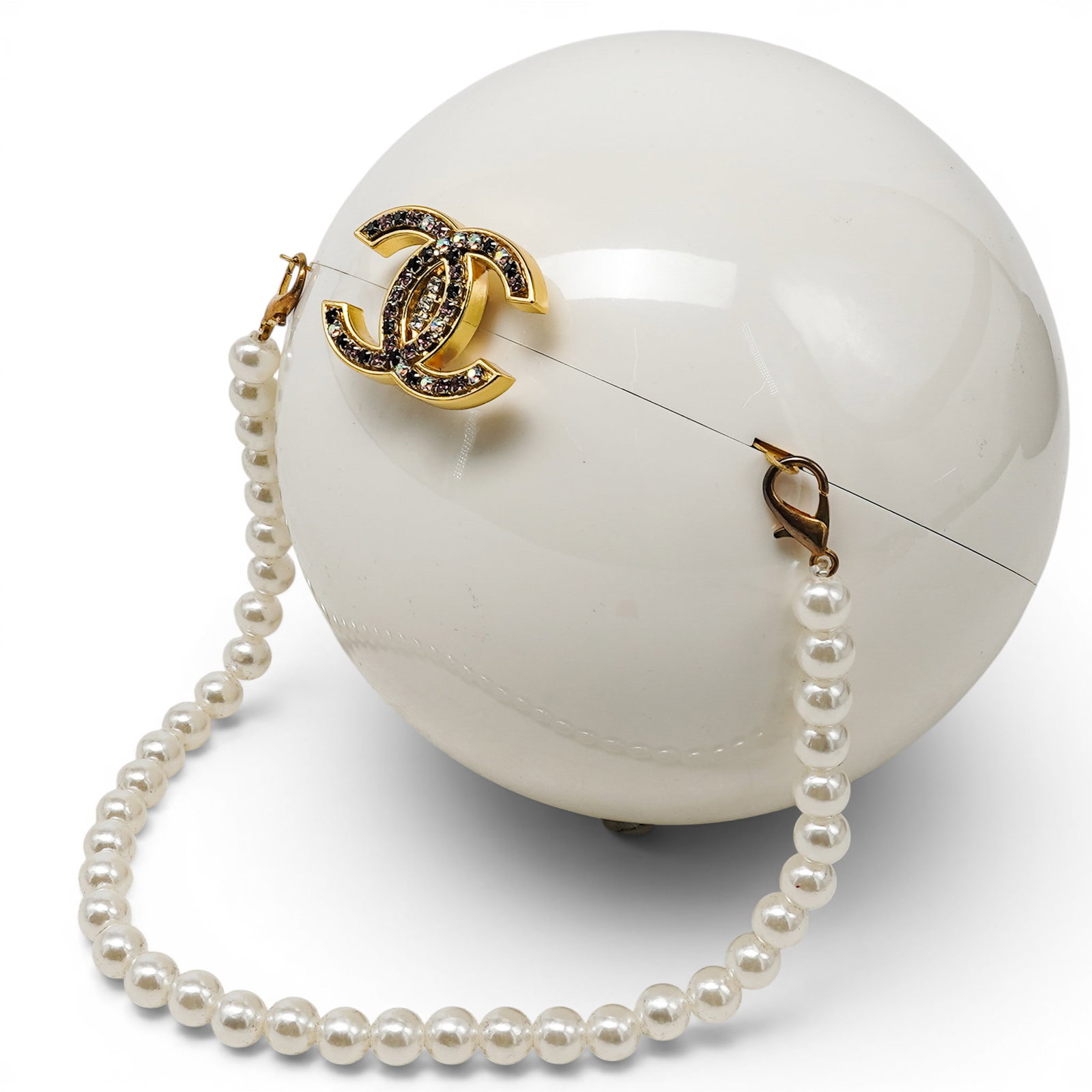 Chanel Plexiglass Sphere Minaudiere Novelty Handbag: Chanel Plexiglass Sphere Minaudiere Novelty Handbag c. 2016, French The item in the image is a Chanel Plexiglass Sphère Minaudière, a rare and highly collectible novelty handbag originally created a