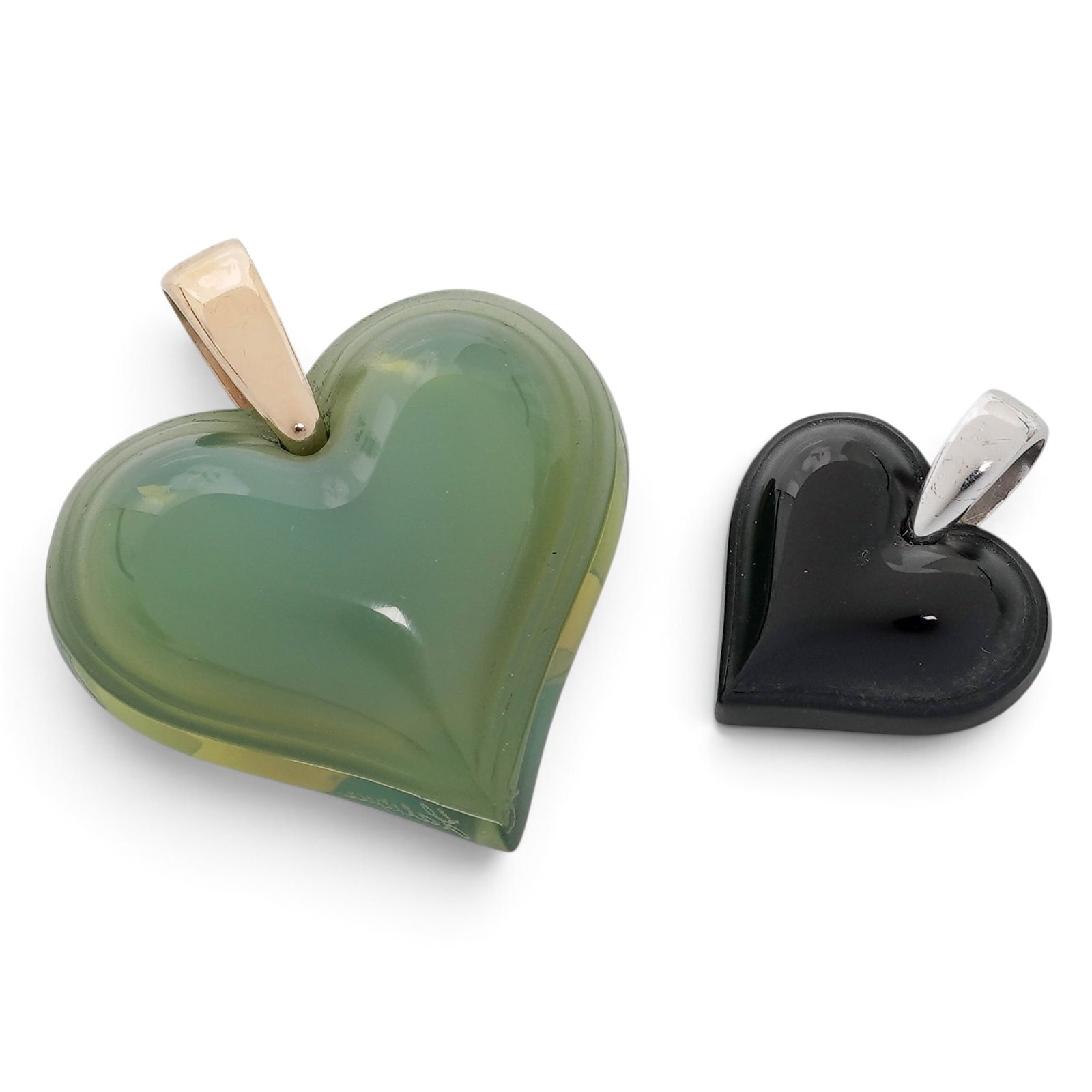 (2 Pc) Lalique French Crystal Heart Pendants: (2 Pc) Lalique French Crystal Heart Pendants 20th century, France (2 pc) Lalique glass heart pendants French crystal Lalique Heart Pendants from their iconic Coeur/Amoureuse fashion jewelry collection