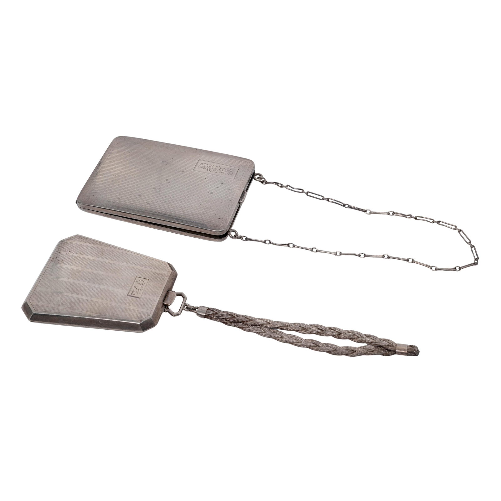 (2 pc) James E. Blake Co & Elgin American Co Sterling Silver Compact Coin Purses: (2 pc) James E. Blake Co & Elgin American Co Sterling Silver Compact Coin Purses c. 1920s, USA (2 pc) Sterling Silver Compact Coin Purses lot includes: 1. The Square Compact James E. Blake Company (At