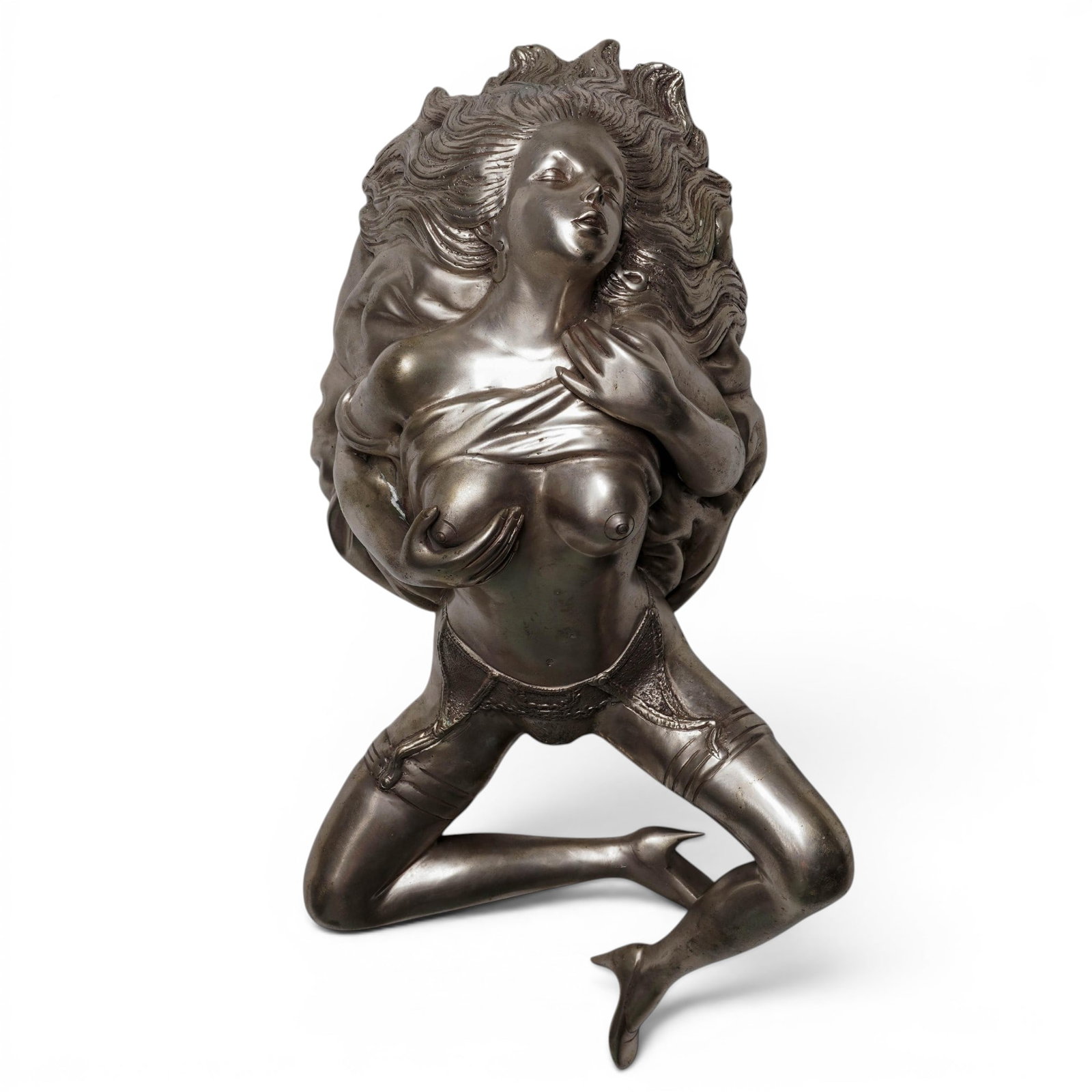 Erotic Silver-Leaf Nude Female Sculpture: Erotic Silver-Leaf Nude Female Sculpture 20th century, USA Silver-leaf nude erotic bronze sculpture has a smooth, semi-matte silver sheen with light silver coloration. The figure is depicted wearing