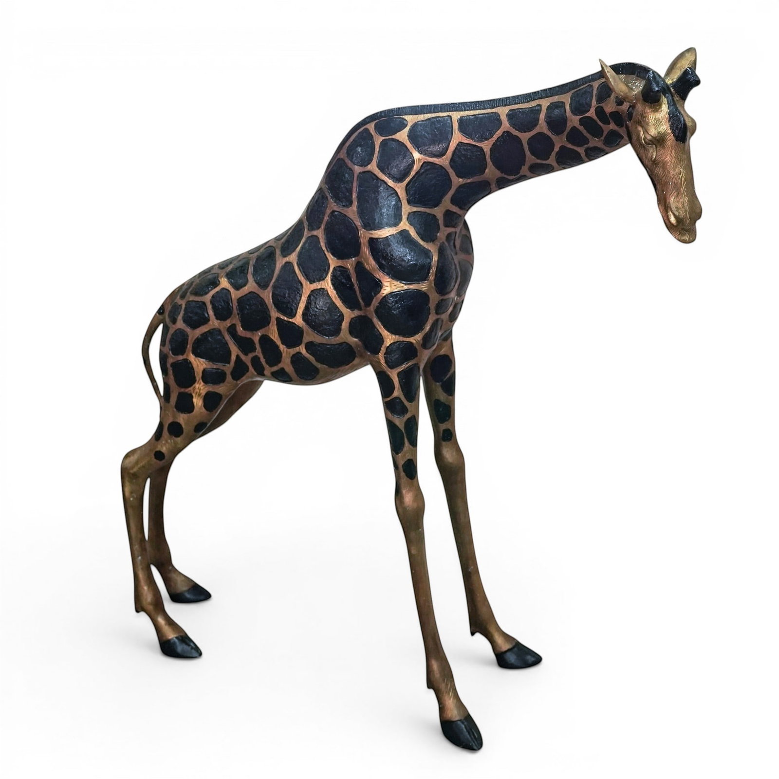 Large MCM Gilt Cast Metal Giraffe Sculpture: Large MCM Gilt Cast Metal Giraffe Sculpture Mid 20th century A large mid-century modern cast metal giraffe sculpture with a gilt metallic finish and black patches, mane, and hooves. H 42.5" x L