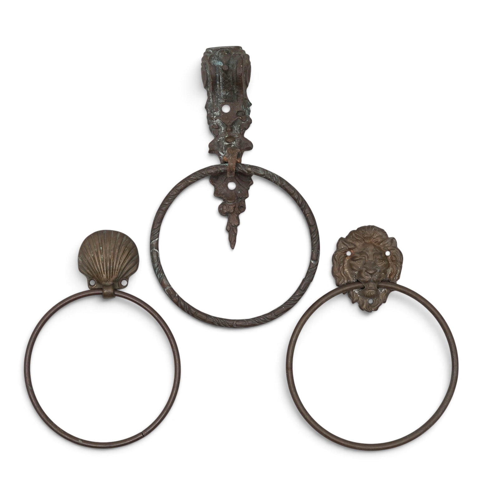 (3pc) Antique Bronze Towel Rings: (3pc) Antique Bronze Towel Rings Early 20th Cent. A lot of bronze towel rings, including a classic scallop-shell design, a traditional lion's-head door-knocker-style motif, and an ornate, textured