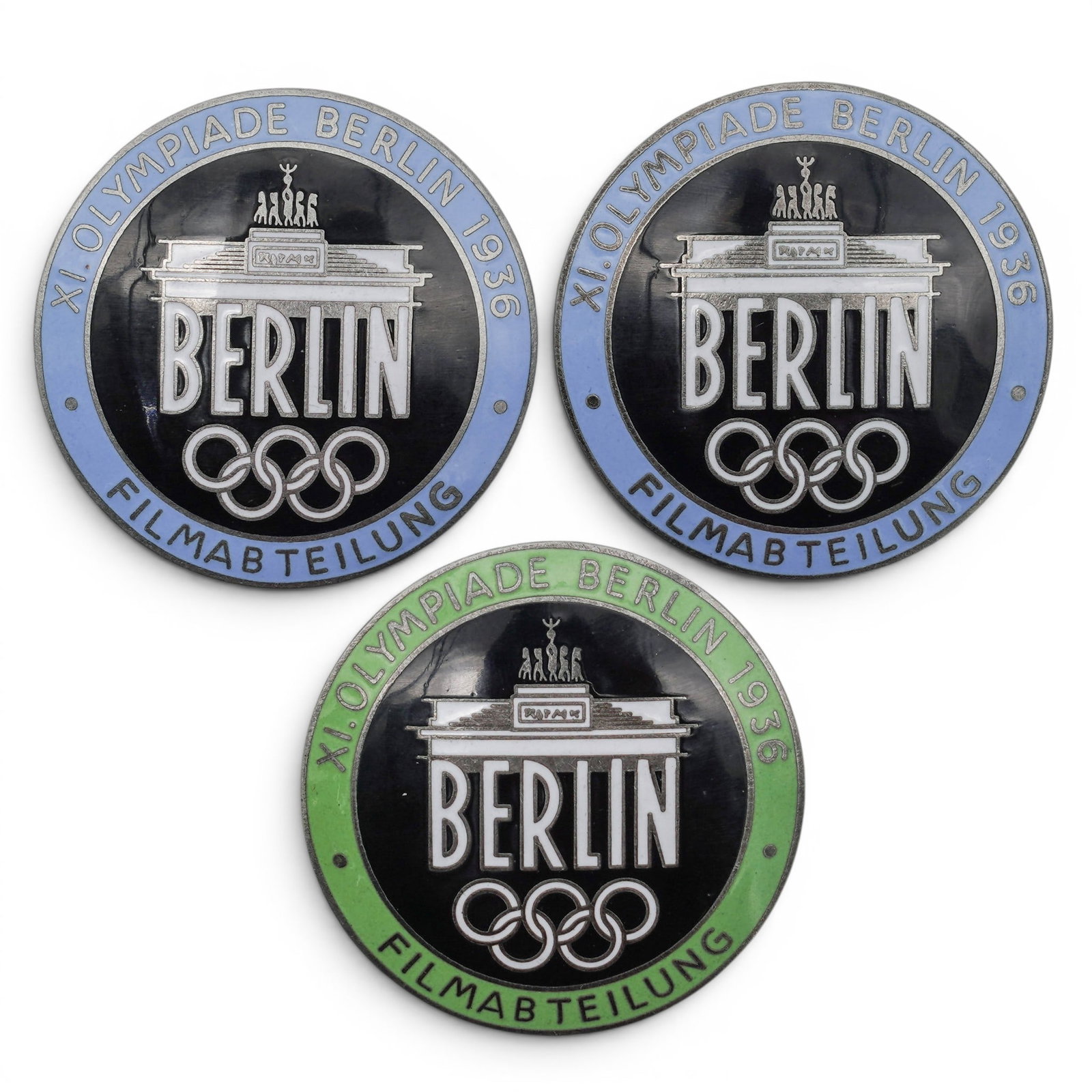 (3 pc) 1936 Berlin Olympics Filmmaker Badges (Filmabteilung) Used Film Crew: (3 pc) 1936 Berlin Olympics Filmmaker Badges (Filmabteilung) Used Film Crew c. 1936, Germany These are 1936 Berlin Olympics Filmmaker Badges (Filmabteilung) used by the film crew, including Leni