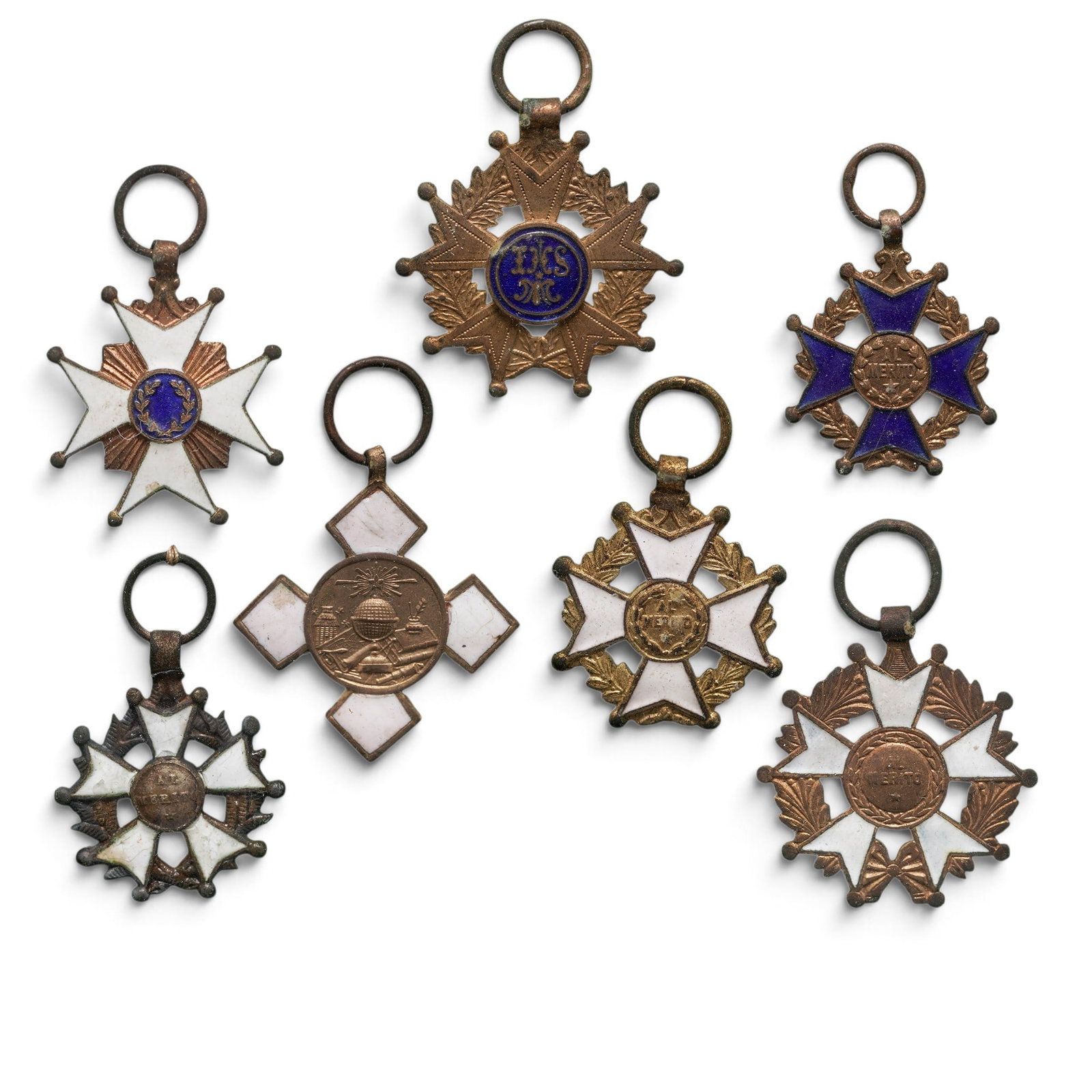 (7 pc) Framed Mexican Merit Badges: (7 pc) Framed Mexican Merit Badges Likely Late 19th - 20th Cent, Mexico Seven metal and enamel merit badges of Mexican origin. Hung on a green backdrop behind protective glass, surrounded by a gilt