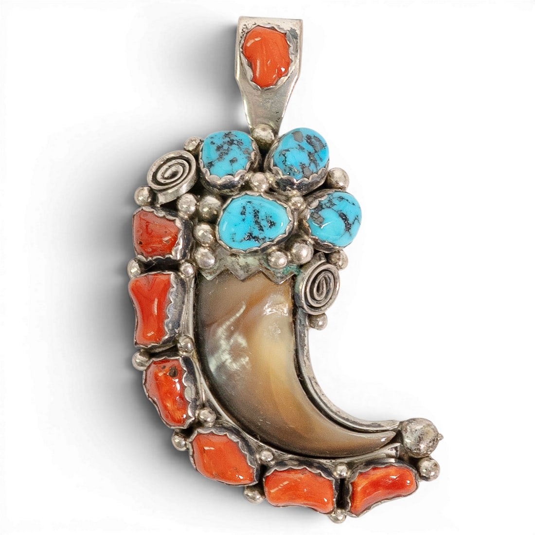 Vintage M. Tsosie Navajo Sterling Silver Turquoise & Coral Pendant: Vintage M. Tsosie Navajo Sterling Silver Turquoise & Coral Pendant 1970-1980s, USA Vintage Navajo sterling silver pendant by M. Tsosie, designed with a large claw-form centerpiece accented by turquois