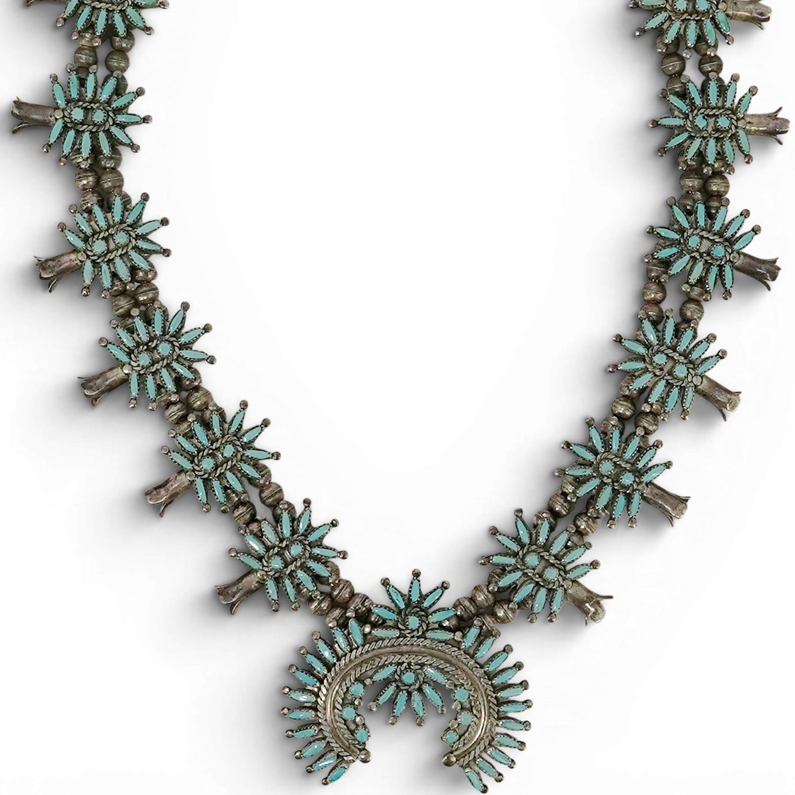 Vintage Ed Niiha Zuni Sterling Silver & Turquoise Petit Point Squash Blossom Necklace: Vintage Ed Niiha Zuni Sterling Silver & Turquoise Petit Point Squash Blossom Necklace 1970s, USA Vintage Zuni sterling silver squash blossom necklace by Ed Niiha, set with turquoise petit point stones