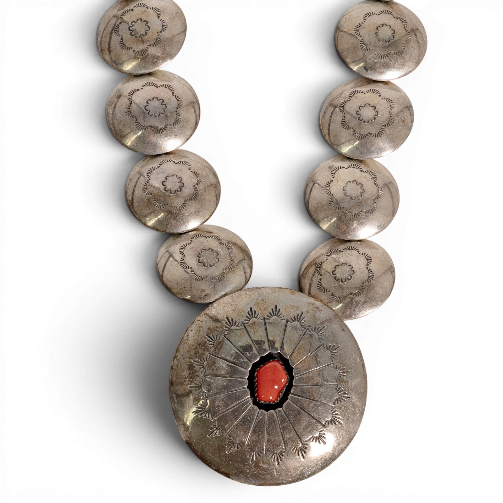 Vintage Navajo Sterling Silver Turquoise & Coral Concho Necklace: Vintage Navajo Sterling Silver Turquoise & Coral Concho Necklace 1970-1980s, USA Vintage sterling silver necklace composed of graduated stamped concho elements decorated with traditional floral and ge