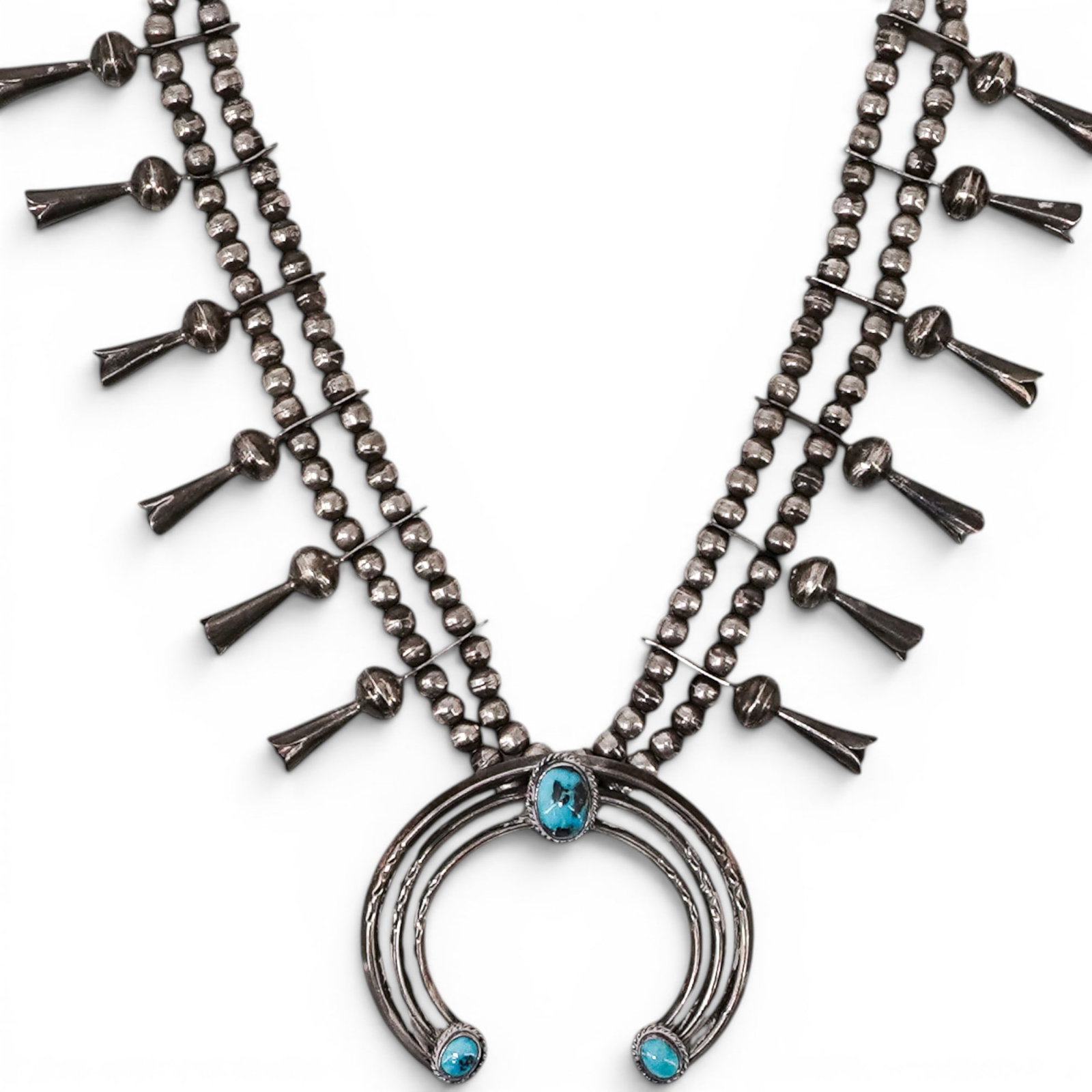 Vintage Navajo Sterling Silver & Turquoise Squash Blossom Necklace: Vintage Navajo Sterling Silver & Turquoise Squash Blossom Necklace 1970s-1980s, USA Vintage Navajo sterling silver squash blossom necklace with double strand silver bead construction, crescent naja ce