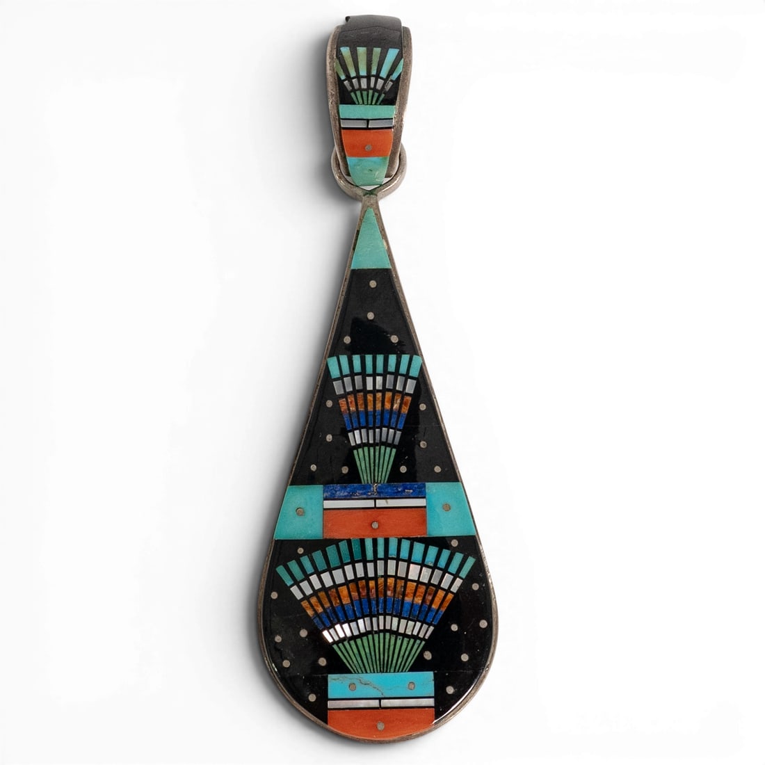 Vintage Ernest Tsosie Navajo Sterling Silver & Multi-Stone Inlay Pendant: Vintage Ernest Tsosie Navajo Sterling Silver & Multi-Stone Inlay Pendant 1970-1980s, USA Vintage sterling silver pendant featuring an elongated teardrop form with geometric mosaic inlay composed of tu