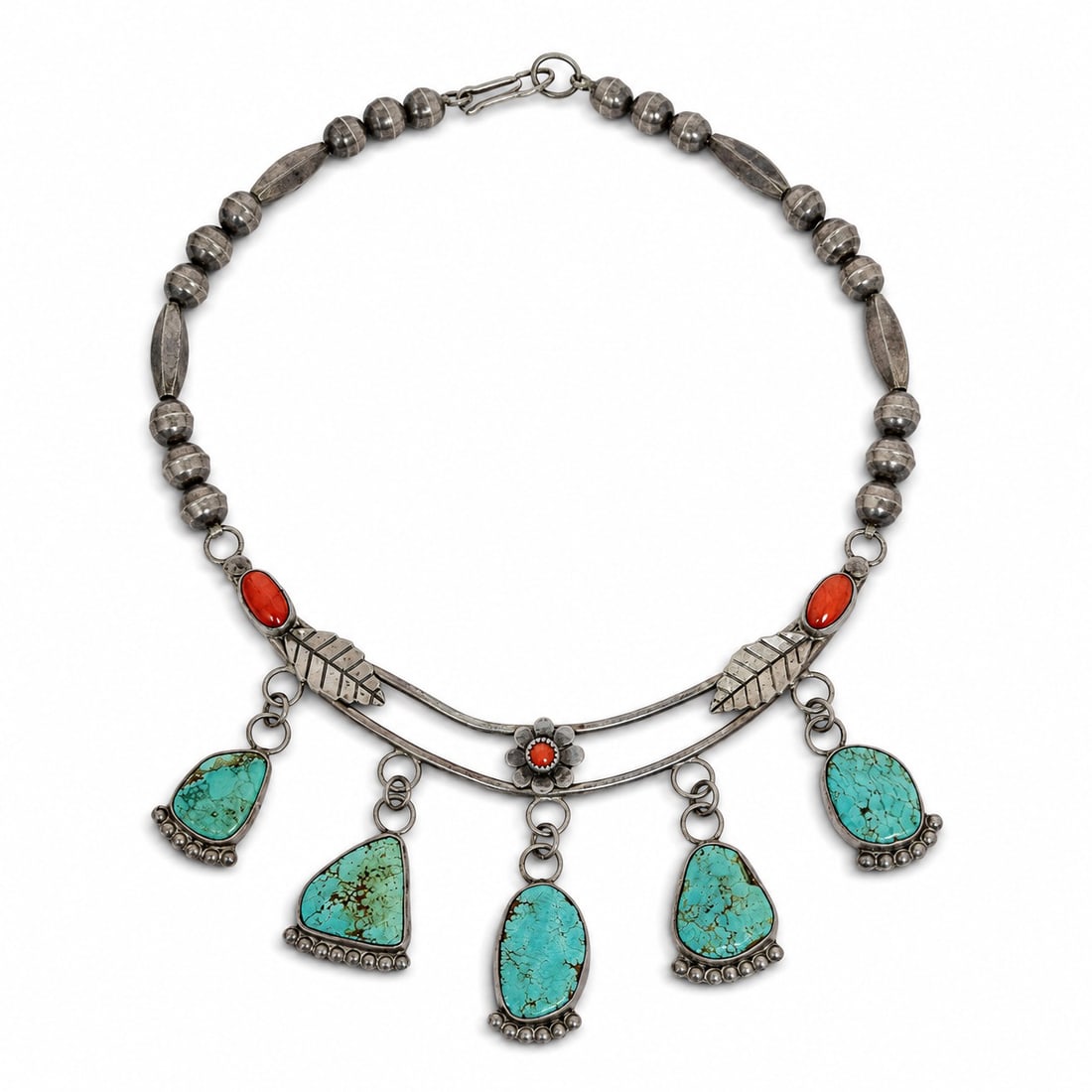 Vintage Navajo Sterling Silver Turquoise & Coral Necklace: Vintage Navajo Sterling Silver Turquoise & Coral Necklace 1970-1980s, USA Vintage Navajo sterling silver necklace set with five turquoise matrix stones in bezel settings, accented by coral cabochons, 