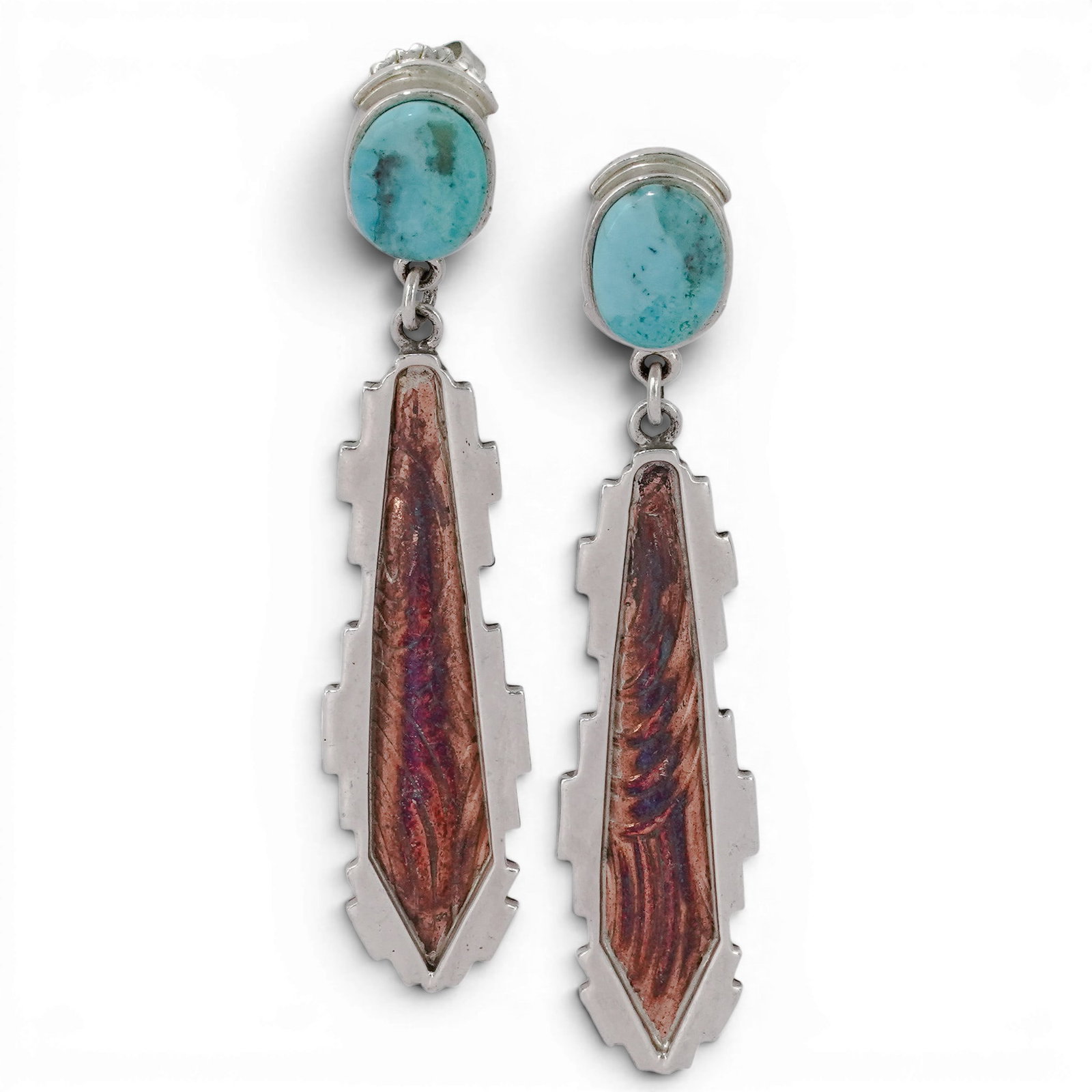 Vintage Navajo Sterling Silver Turquoise & Copper Overlay Feather Earrings Signed: Vintage Navajo Sterling Silver Turquoise & Copper Overlay Feather Earrings Signed 1970-1980s, USA Pair of sterling silver dangle earrings featuring oval turquoise cabochon tops suspending elongated fe