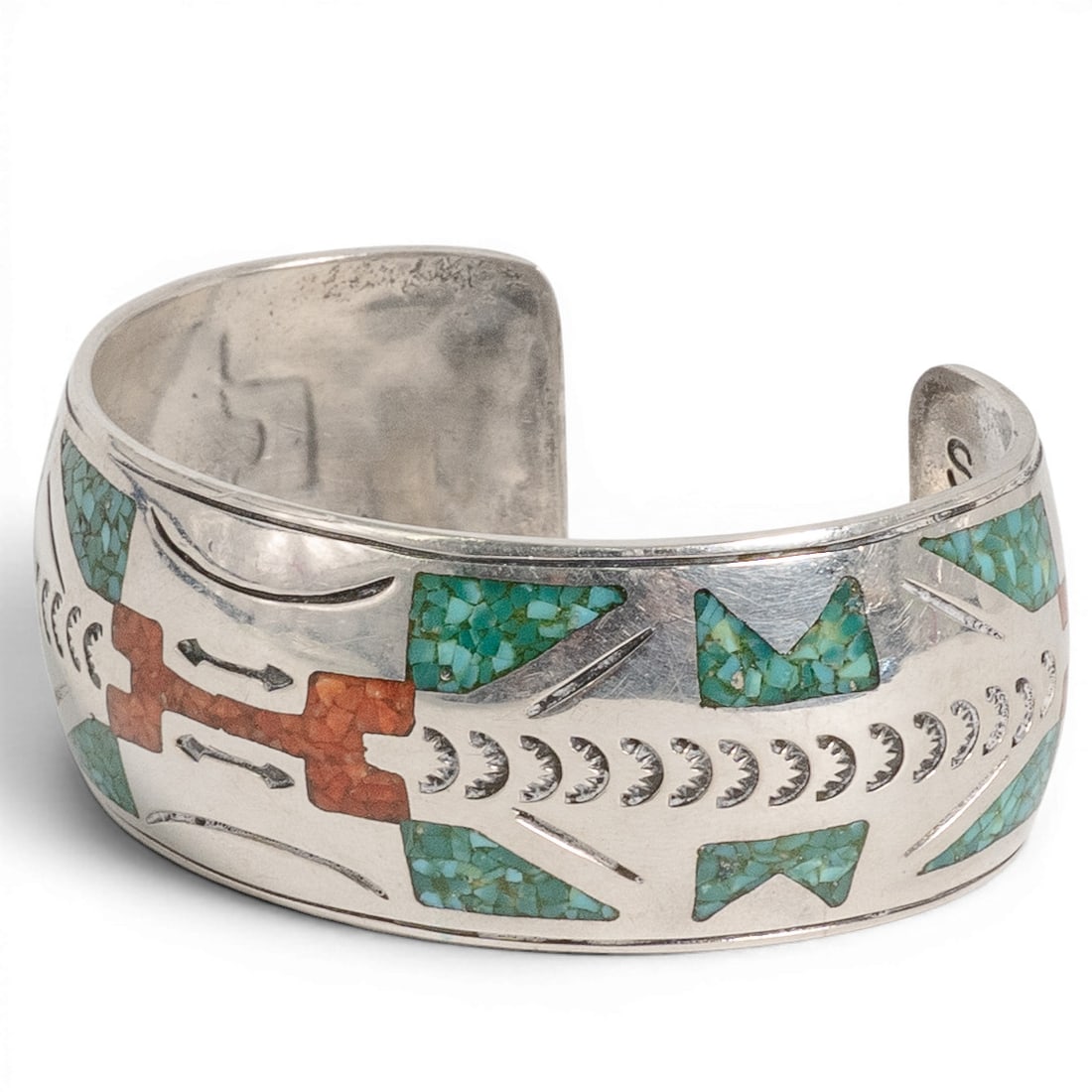 Tommy Singer Navajo Sterling Silver Turqouise & Coral Inlay Cuff: Tommy Singer Navajo Sterling Silver Turqouise & Coral Inlay Cuff 1970-1980s Vintage Navajo sterling silver cuff bracelet by Tommy Signer, featuring turquoise chip inlay and coral inlay in a geometric 