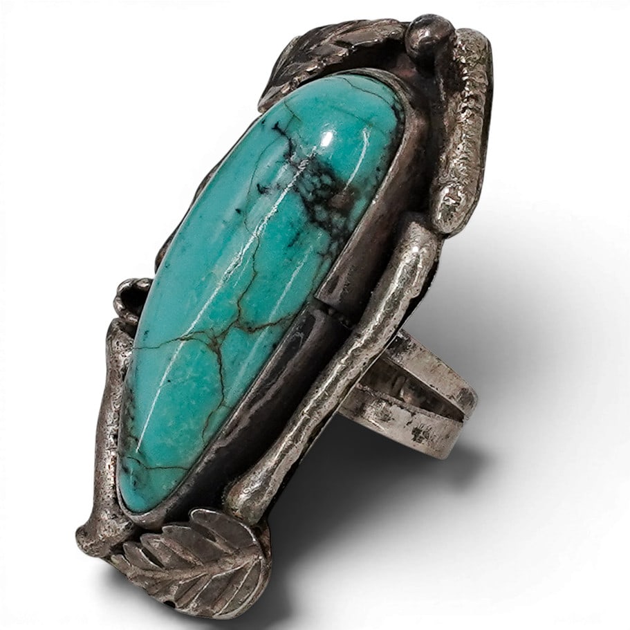 Vintage Navajo Sterling Silver & Large Turquoise Leaf Motif Ring Signed: Vintage Navajo Sterling Silver & Large Turquoise Leaf Motif Ring Signed 1970-1980s, USA Vintage Navajo sterling silver ring featuring a substantial elongated turquoise cabochon framed within an organi