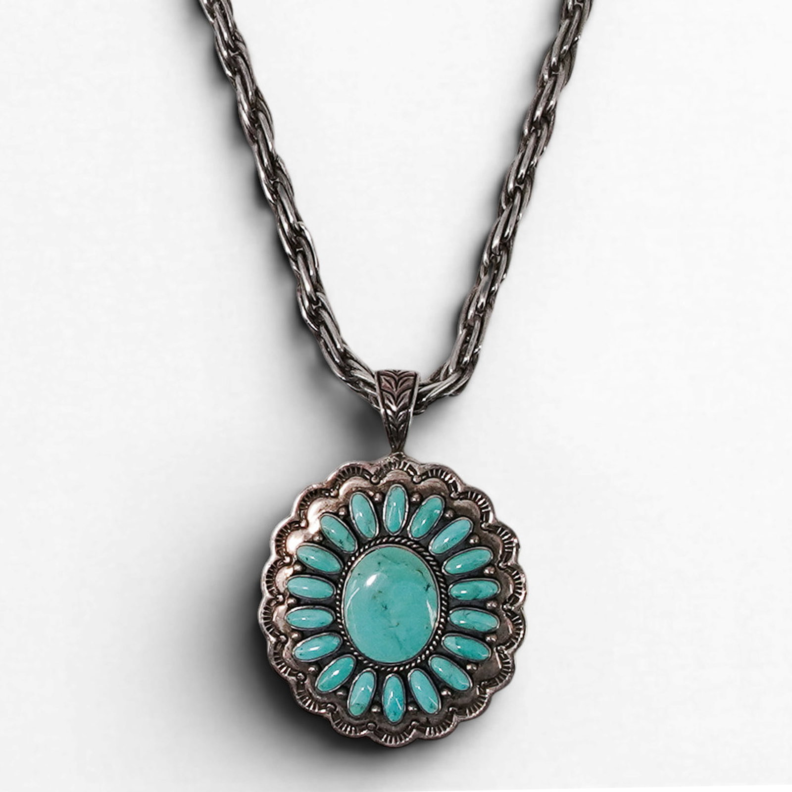 Vintage Silver Expressions Sterling Silver & Turquoise Cluster Pendant Necklace: Vintage Silver Expressions Sterling Silver & Turquoise Cluster Pendant Necklace Late 20th Century, Philippines Vintage sterling silver pendant necklace by Silver Expressions featuring a large oval tur