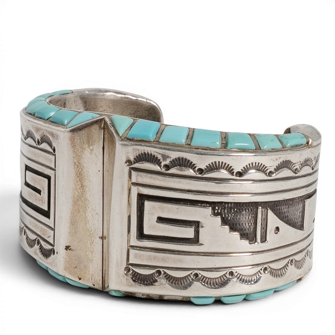Vintage Navajo Sterling Silver & Turquoise Cuff Bracelet Signed: Vintage Navajo Sterling Silver & Turquoise Cuff Bracelet Signed 1970-1980s A vintage heavy sterling silver cuff bracelet featuring overlay construction with geometric Pueblo-inspired motifs, and hand-