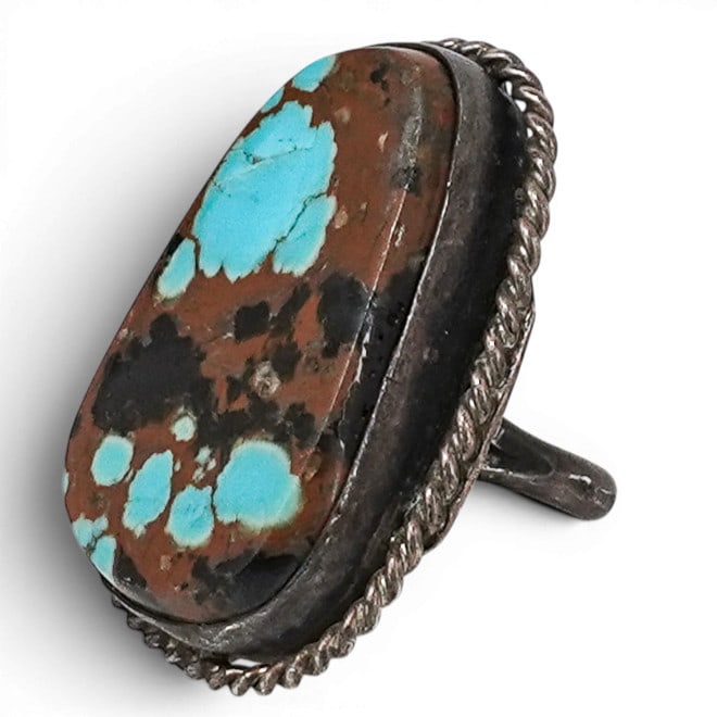 Vintage Navajo Sterling Silver & Royston Turquoise Ring: Vintage Navajo Sterling Silver & Royston Turquoise Ring 1970-1980s, USA Vintage Navajo sterling silver ring featuring a large oval Royston turquoise cabochon displaying characteristic brown host rock 