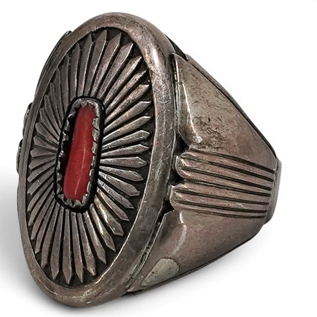 Vintage Keoni Navajo Sterling Silver & Coral Sunburst Ring: Vintage Keoni Navajo Sterling Silver & Coral Sunburst Ring 1970-1980s, USA Vintage Navajo sterling silver ring by Keoni, featuring an oval coral cabochon in a serrated bezel setting centered within a 