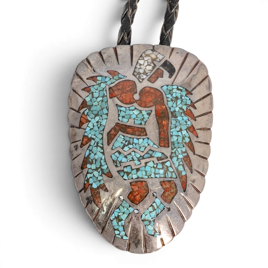 Vintage T. Begay Navajo Sterling Silver & Multi-Stone Inlay Kachina Bolo Tie: Vintage T. Begay Navajo Sterling Silver & Multi-Stone Inlay Kachina Bolo Tie 1970-1980s, USA Vintage sterling silver bolo tie featuring a large oval slide decorated with a stylized Kachina figure exec