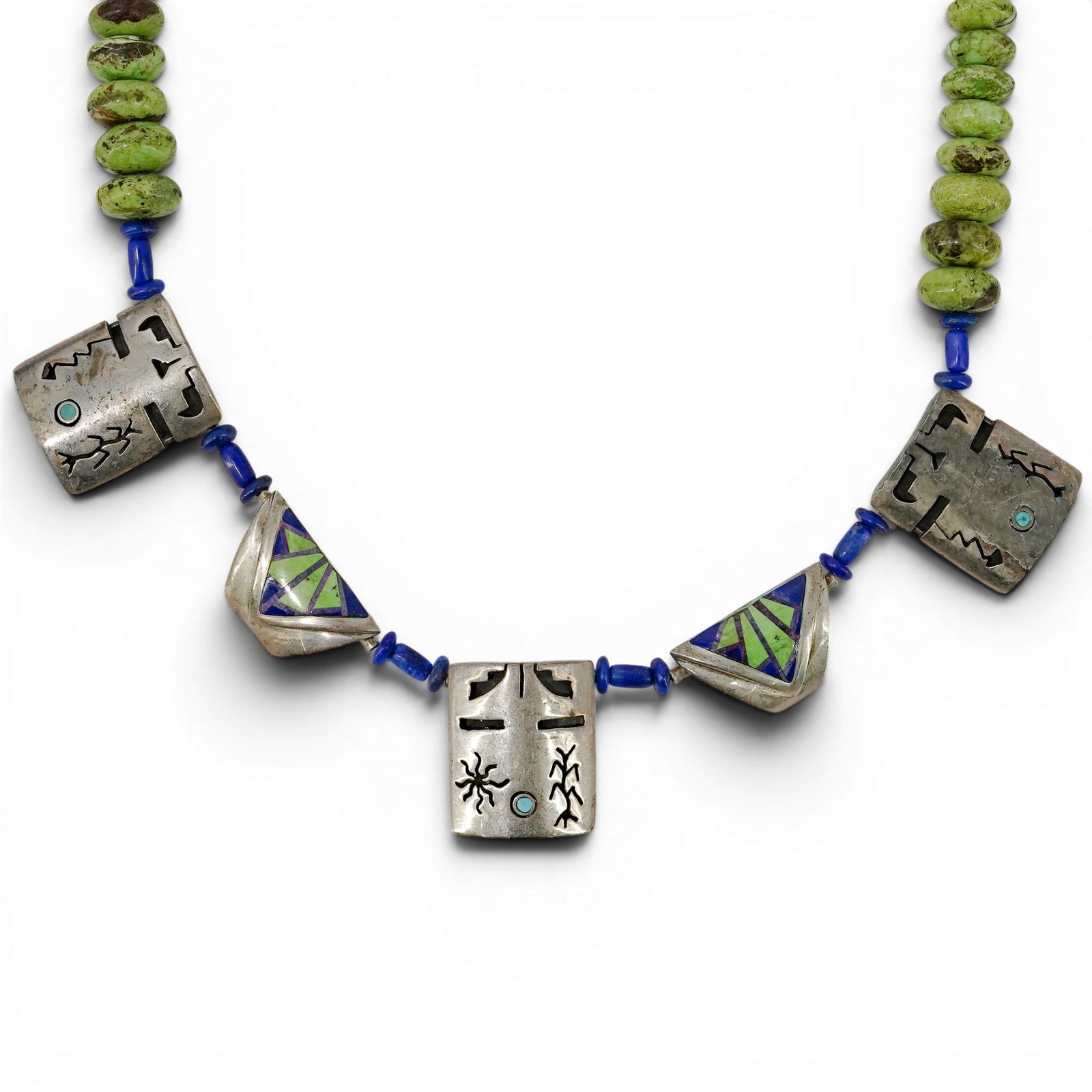 Vintage Fernando Benally Sterling Silver & Multi-Stone Inlay Necklace: Vintage Fernando Benally Sterling Silver & Multi-Stone Inlay Necklace 1970-1980s, USA Vintage sterling silver necklace featuring carved silver geometric panels with engraved Navajo-inspired motifs, tu