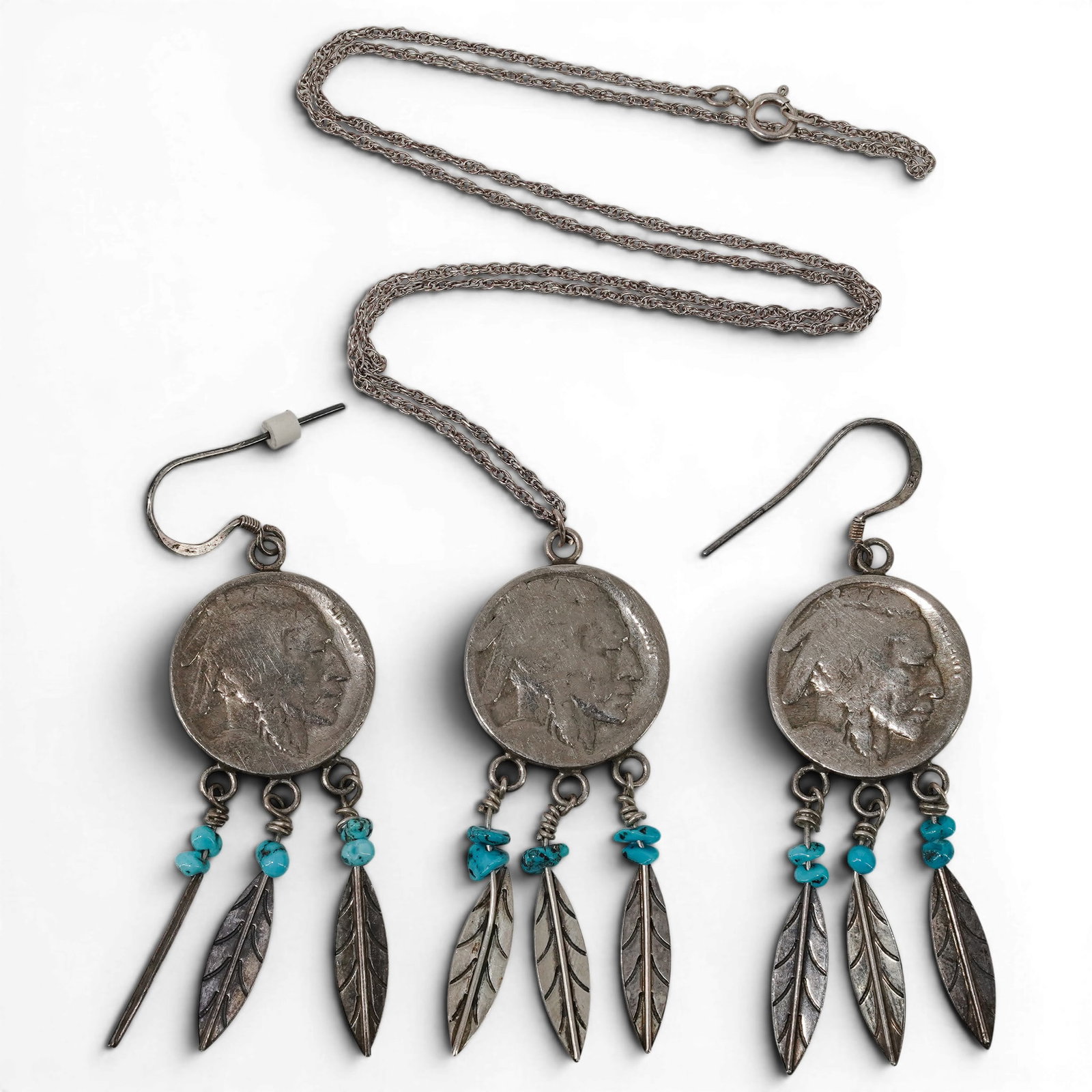 Vintage Southwestern Sterling Silver & Turquoise Buffalo Nickel Jewelry Set: Vintage Southwestern Sterling Silver & Turquoise Buffalo Nickel Jewelry Set 1970s-1980s, USA Vintage Southwestern jewelry set featuring a pendant necklace and matching dangle earrings with Buffalo nic