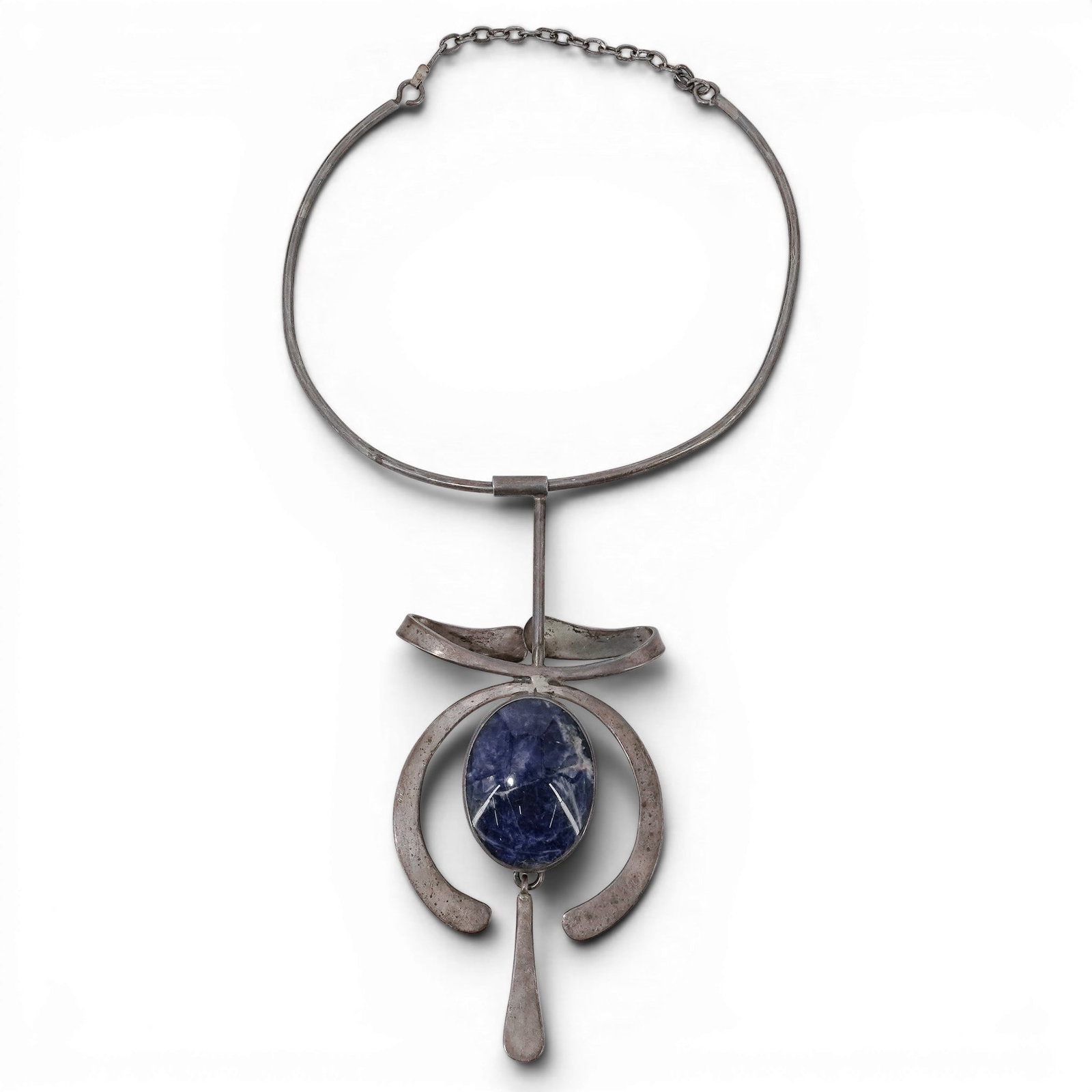 Vintage Alain Tessier Modernist Sterling Silver & Sodalite Modernist Necklace: Vintage Alain Tessier Modernist Sterling Silver & Sodalite Modernist Necklace 1970-1980s, USA Vintage sterling silver necklace featuring a large oval sodalite cabochon mounted within an abstract moder