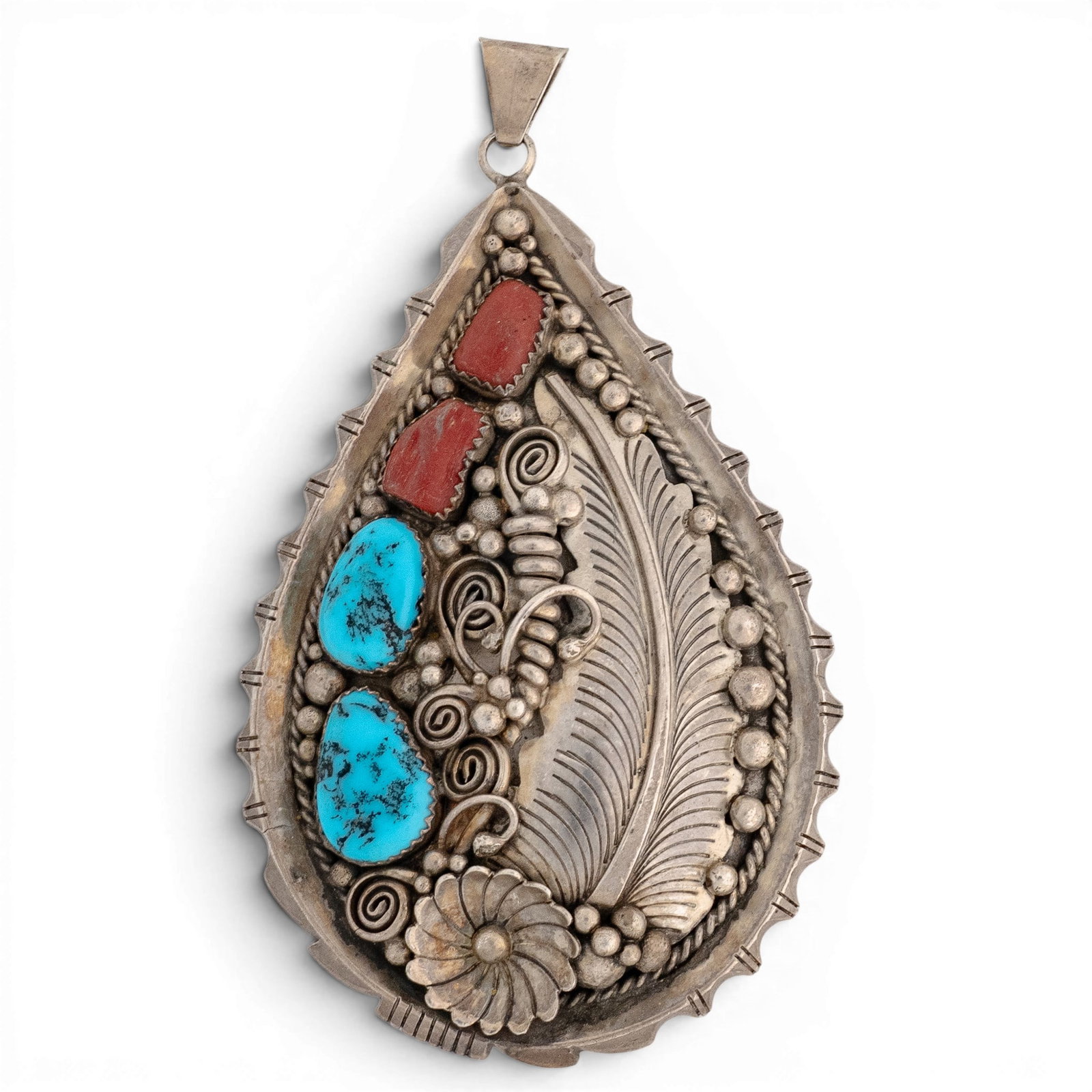 Vintage Rose Castillo Navajo Sterling Silver Turquoise & Coral Feather Pendant: Vintage Rose Castillo Navajo Sterling Silver Turquoise & Coral Feather Pendant 1970-1980s, USA Large vintage sterling silver teardrop-form pendant featuring two turquoise and two coral cabochons in se