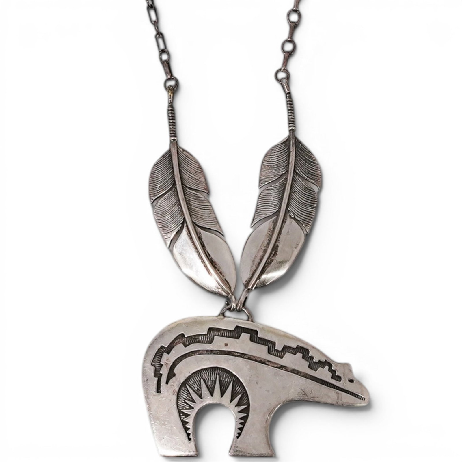 Vintage Glenn and Irene Sandoval Navajo Sterling Silver Bear Necklace: Vintage Glenn and Irene Sandoval Navajo Sterling Silver Bear Necklace 1970s-1980s, USA Vintage Southwestern sterling silver necklace by Glenn and Irene Sandoval, featuring a large stamped bear pendant