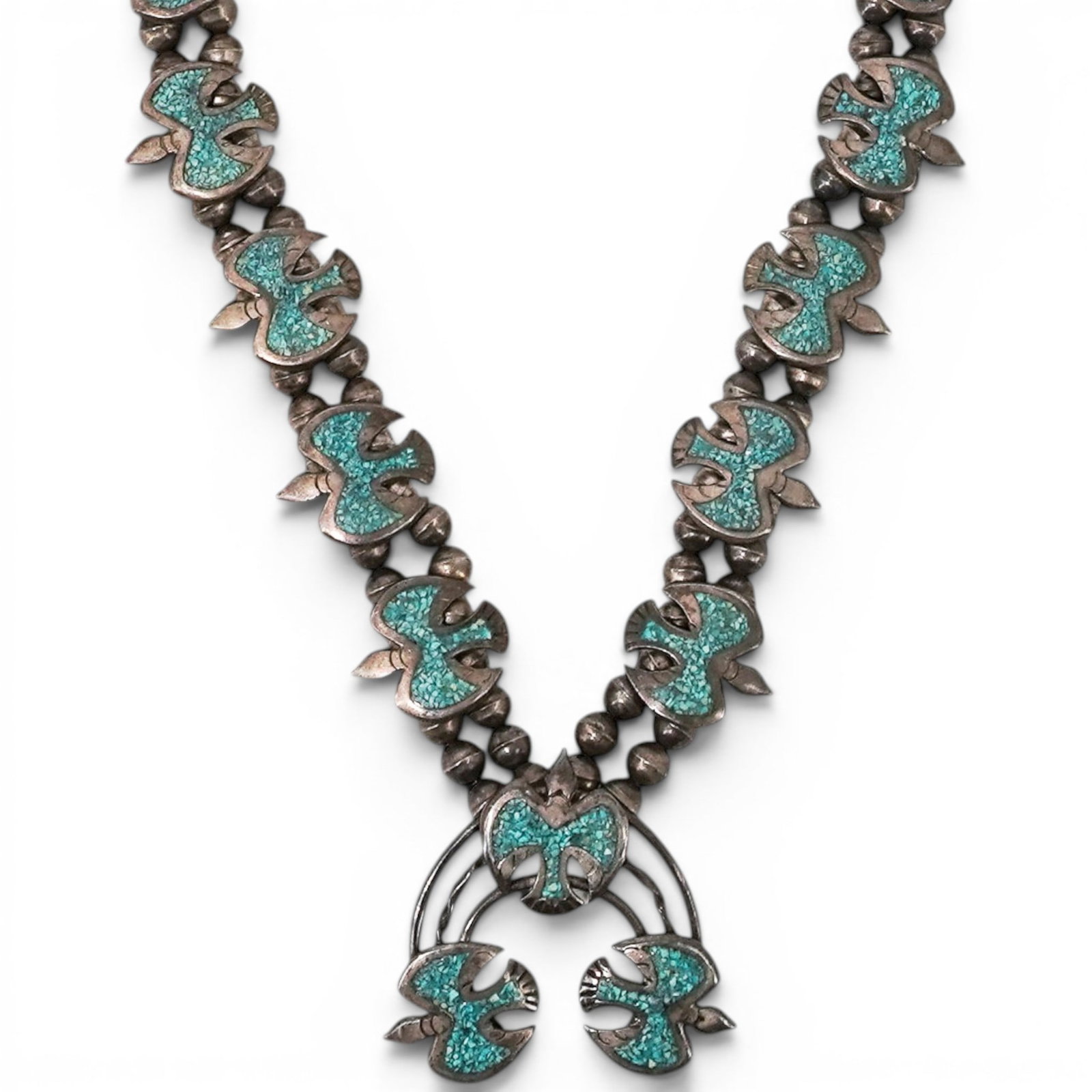 Vintage Navajo Sterling Silver & Turquoise Inlay Thunderbird Squash Blossom Necklace: Vintage Navajo Sterling Silver & Turquoise Inlay Thunderbird Squash Blossom Necklace 1970-1980s, USA Vintage Navajo sterling silver squash blossom necklace featuring a double strand of traditional Nav