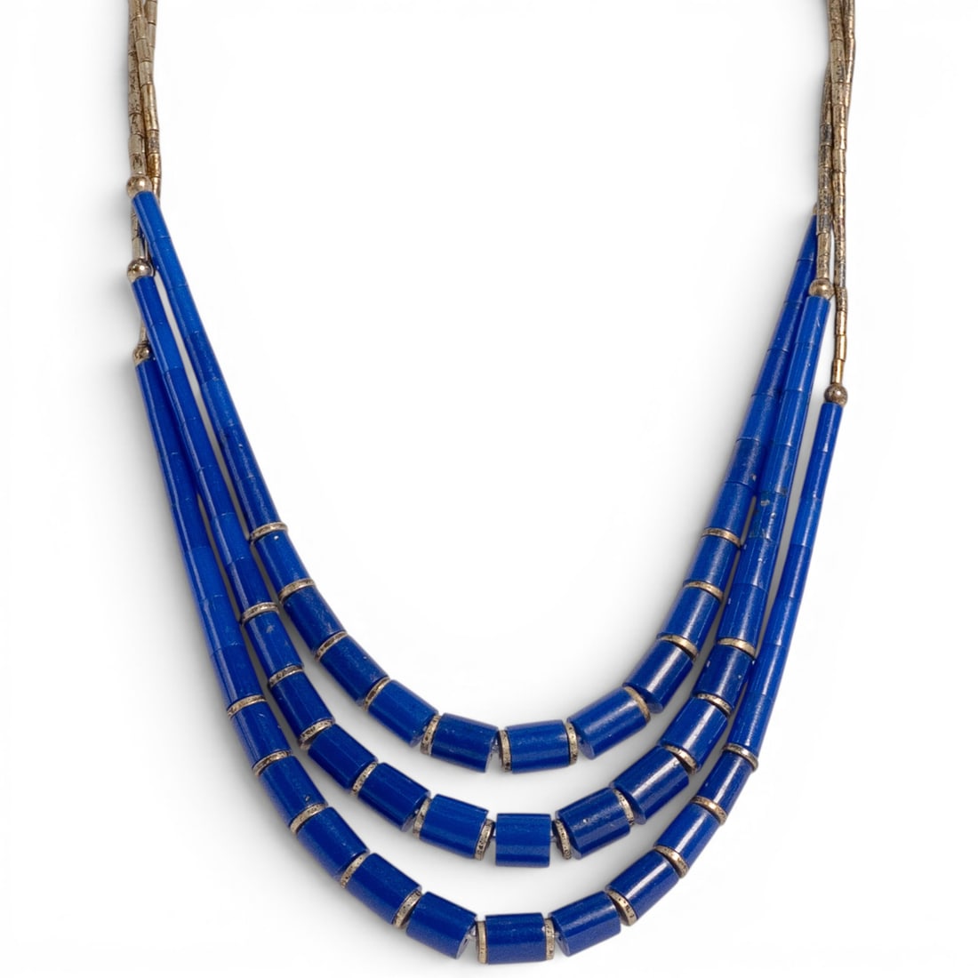Vintage Navajo Sterling Silver & Lapis Heishi Necklace: Vintage Navajo Sterling Silver & Lapis Heishi Necklace 1970s-1980s, USA Vintage Navajo sterling silver necklace featuring multi-strand heishi construction with cobalt blue lapis tube beads. The neckla