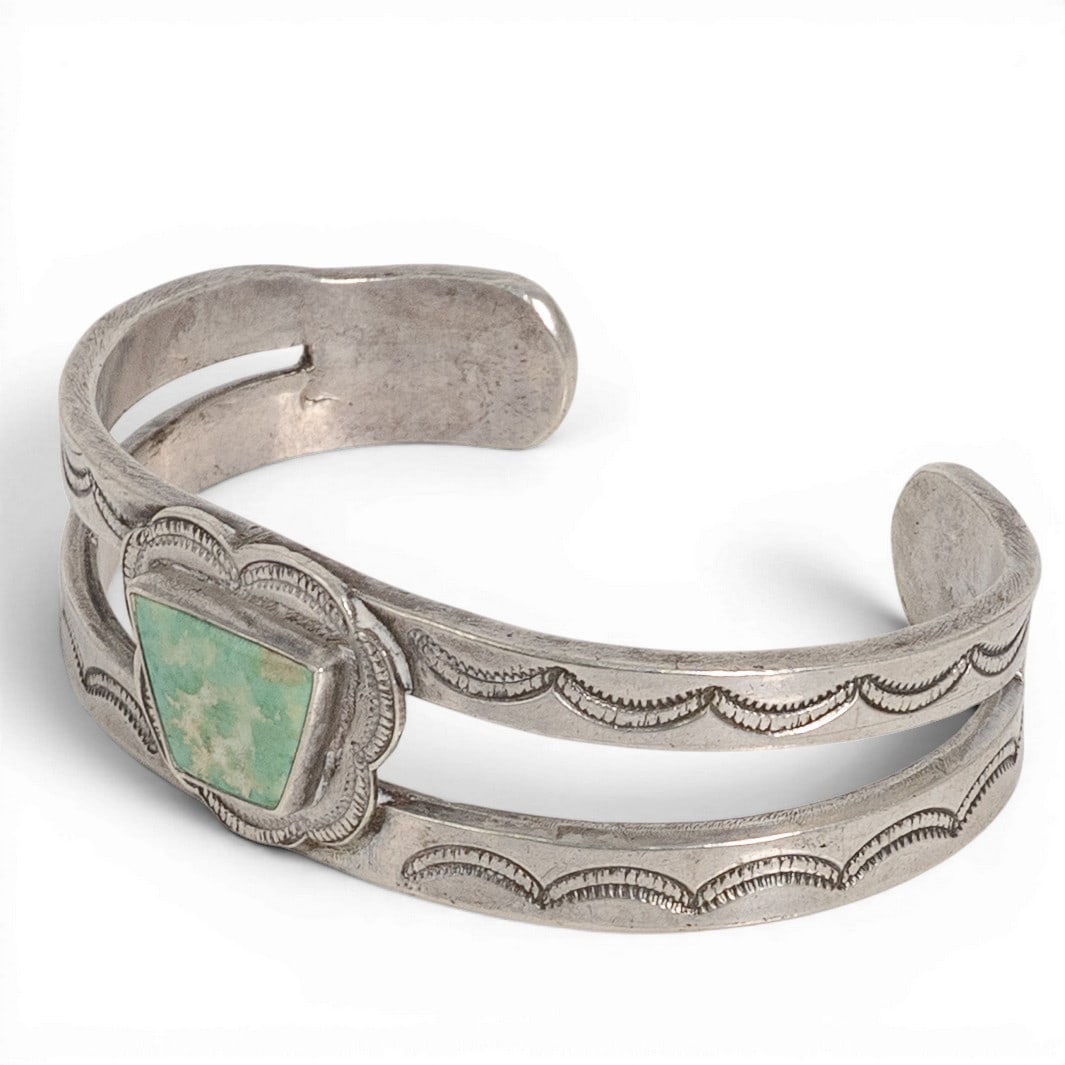 Vintage Navajo Sterling Silver & Green Turquoise Split Shank Cuff Bracelet: Vintage Navajo Sterling Silver & Green Turquoise Split Shank Cuff Bracelet 1970-1980s, USA Vintage Navajo sterling silver cuff bracelet featuring a geometric green turquoise cabochon bezel-set within 